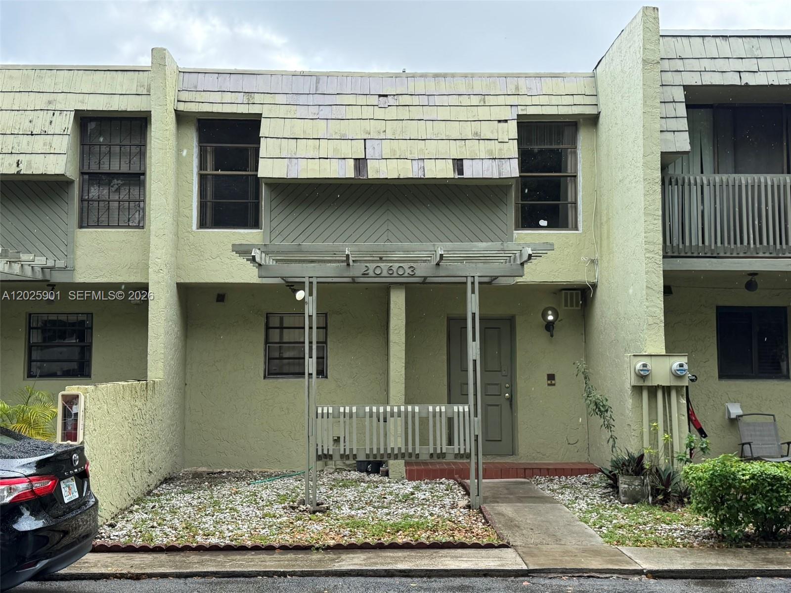 Great opportunity to own a spacious 3-bedroom, 2.5-bath townhome in a gated community in Miami Gardens. Centrally located in a quiet neighborhood close to major highways, shopping, and dining. This property features an open floor plan with an eat-in kitchen, living/dining area, half bath, and laundry room on the first floor. Sliding glass doors lead to a screened patio and fenced backyard. The second floor offers a master bedroom with full bathroom plus two additional bedrooms and another full bath. Community amenities include a pool.

Property is being sold AS-IS and needs repairs and updating, including flooring, interior paint, and general maintenance throughout. No appliances included in the sale. Seller has priced below market value to account for needed renovations, making this an excellent opportunity for investors or buyers looking to customize the home to their taste.
