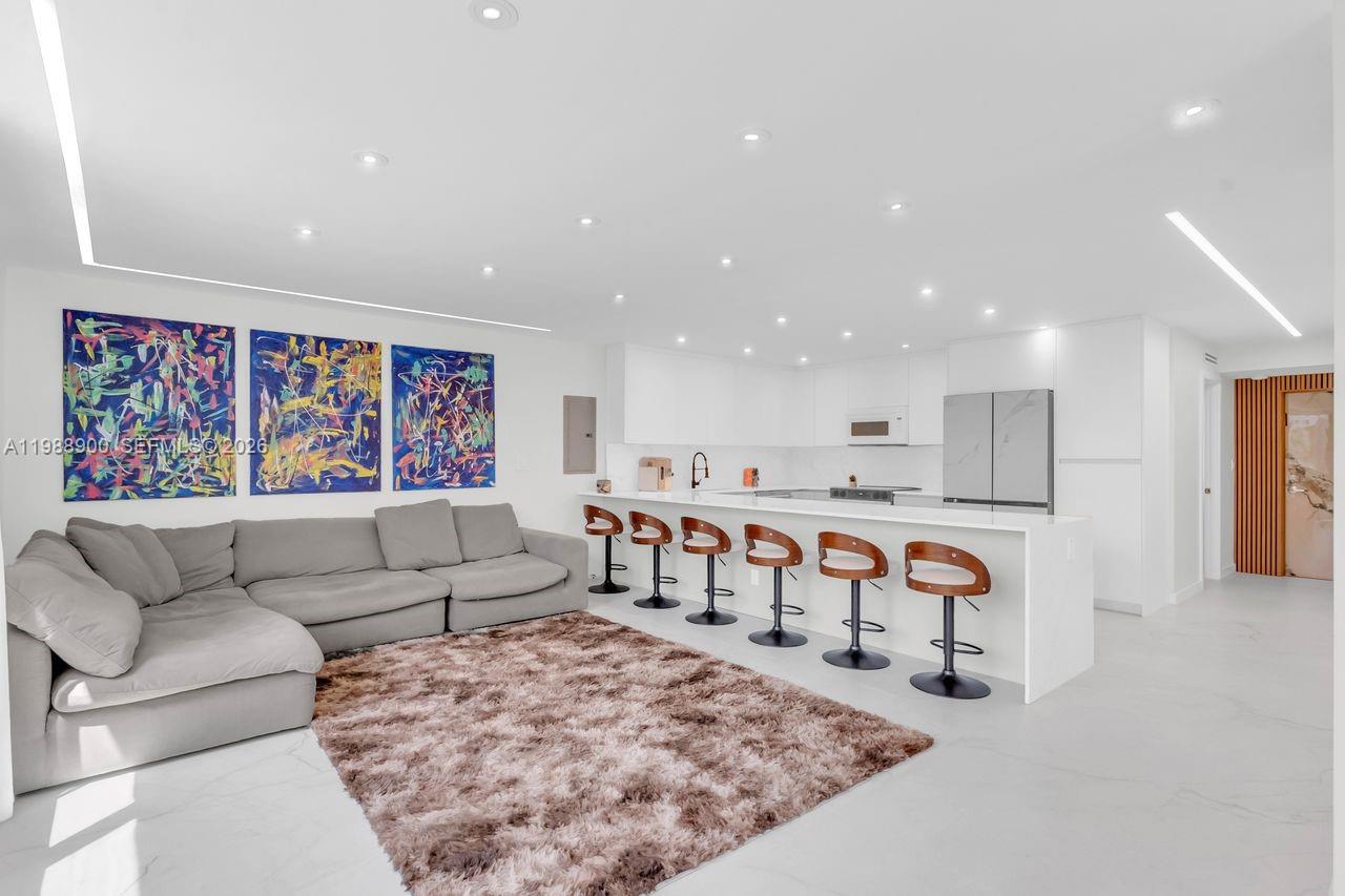 Step into modern elegance with this beautifully completely renovated residence featuring sleek porcelain tile flooring throughout, brand-new impact windows and doors, and custom-made closets designed for optimal storage and style, new plumbing & appliances. Every detail has been thoughtfully updated to create a fresh, move-in-ready home. Perfectly located in Aventura, you’ll enjoy easy access to world-class shopping, dining, golf courses, and the beach. This property combines contemporary finishes with the convenience of a prime location, ideal for both full-time living and as a seasonal retreat.