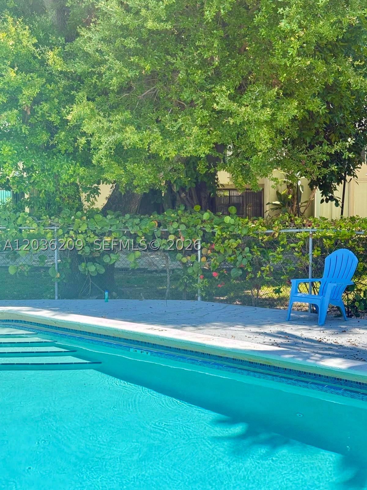 Centrally located, quiet villa with pool and inside-unit laundry room. 2/1. Easy to show.