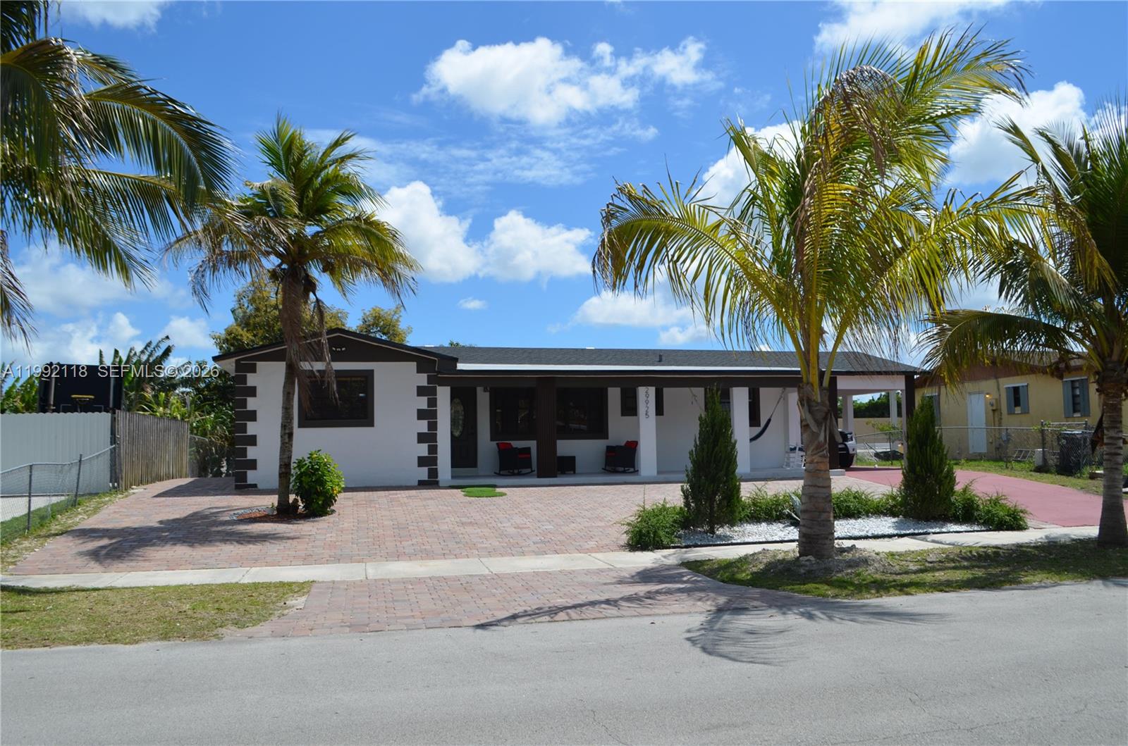 Completely renovated in 2026, 4  bedrooms 3 baths, main 3/2 and a 1/1 independant. New roof. Enjoy patio lanai with a view to the canal on the back.  Driveway with plenty of parking. Close to Turnpike for easy access.