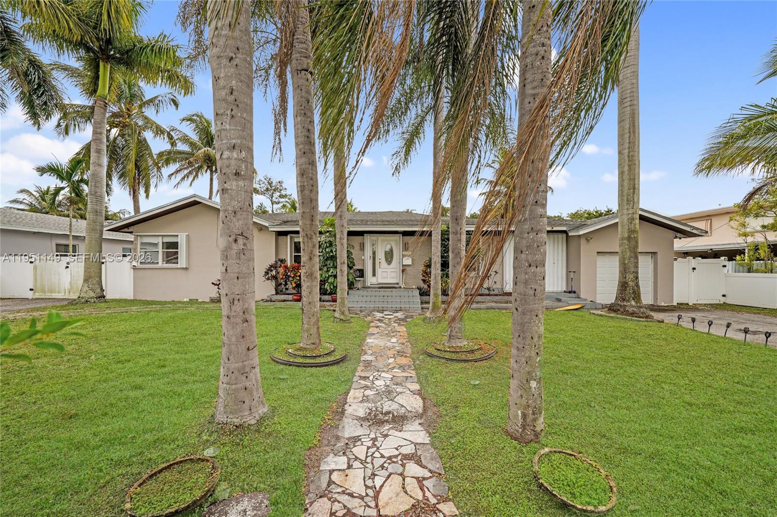 Welcome to your Hollywood Estate home! This beautiful 4 bedroom, 2 bath home offering 3,081 sq ft of living space on a huge 20,350sft lot with no HOA. This bright and spacious home features tile flooring, recessed lighting, ceiling fans throughout, and an open kitchen with stainless steel appliances.

The oversized primary suite includes a walk-in closet, double sinks, a walk-in shower, and a relaxing jet tub. Step outside to an expansive fenced backyard with fruit trees and an extra-large pool perfect for entertaining and outdoor living. Additional features include a large driveway and a 1-car garage. Minutes to Hollywood beach and board walk. Huge potential for rental income, please inquire with listing agent for more information.