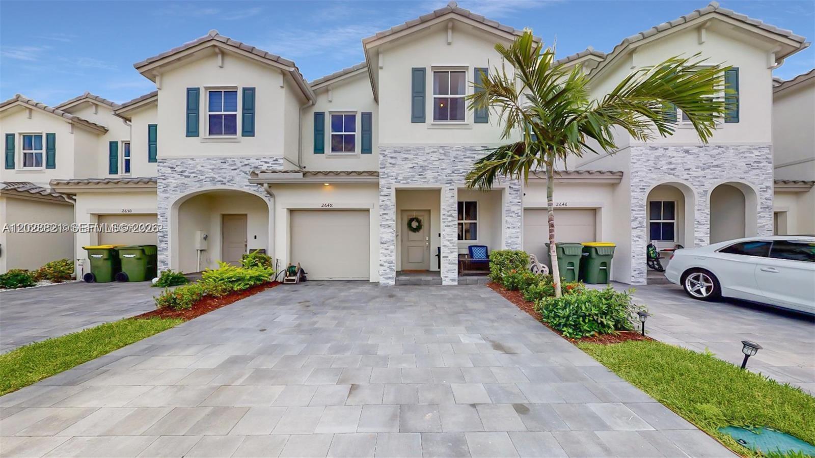 Beautifully maintained townhouse available in the desirable Riviera community in Homestead. This spacious residence offers 3 bedrooms and 2.5 bathrooms, blending modern style with everyday comfort. The thoughtfully designed floor plan features an inviting living and dining area, along with a bright open-concept family room that flows seamlessly into the kitchen, creating the perfect space for entertaining and daily living. The kitchen is appointed with stainless steel appliances, modern countertops, and generous cabinet storage. Upstairs, the primary suite offers a walk-in closet and a private bathroom, while two additional bedrooms and a full bath provide flexibility for family, guests, or a home office. Enjoy outdoor living in the private fenced backyard, along with the convenience of a one-car garage and a brick-paver driveway. Residents of Riviera enjoy access to outstanding amenities.