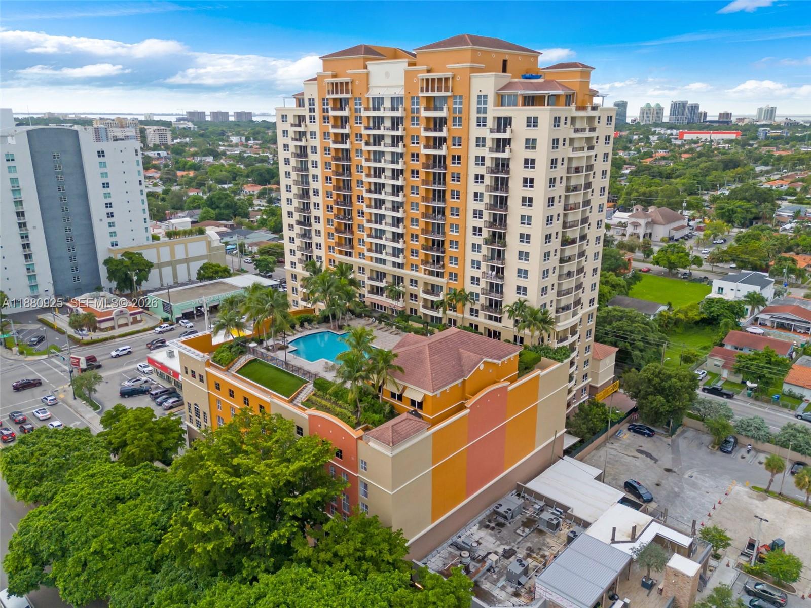Excellent location and close to everything. Walking distance to major retail, restaurants and grocery stores.  This is a full service residence with 24 hour concierge and security. Huge pool, exercise room, club room ,conference/study room, and covered parking.  This unit owner purchased an additional covered parking spot which comes with the sale. Sought after corner unit.  5 short blocks to Miracle Mile which offers great dining and retail. 10 minute drive to MIA Airport. As a 3/3 this unit offers spacious living with beautiful tile floors and has been meticulously maintained.