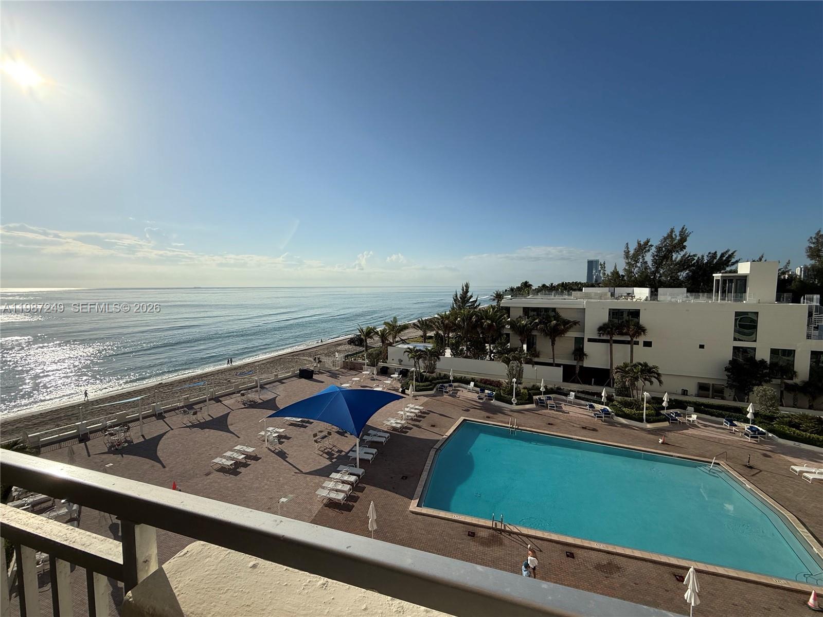Welcome to paradise. Stunning oceanfront 2BR/2BA with unobstructed views of the ocean, pool, and Golden Beach estates. This flexible split-bedroom layout features two private suites - the master bedroom has a king size bed and the second bedroom has a custom queen size Murphy bed, creating expansive open living space ideal for entertaining. Renovated kitchen with sleek cabinetry, updated finishes, and newer flooring throughout. Spacious primary suite with en-suite bath and generous closets; second bath fully renovated. New hurricane impact windows and sliding door. Located in Parker Dorado with resort-style amenities: heated pool, beach service, 2 fitness centers, saunas, BBQ, valet, and 24/7 security. Maintenance includes A/C, hot water, fiber optics basic cable & internet. Building undergoing upgrades—all assessments paid by seller. Ideally located near shopping, dining and everything Hallandale beach has to offer. Prime opportunity for luxury coastal living or investment.