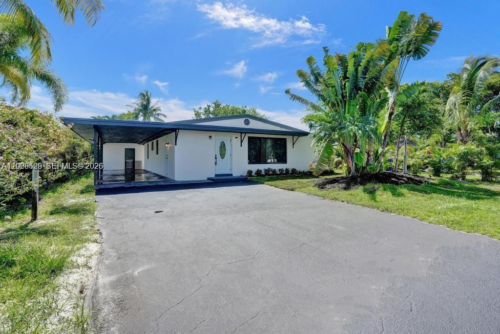 EMBRACE MODERN LIVING JUST MOMENTS FROM WILTON MANORS IN THIS FULLY RENOVATED 4-BEDROOM, 2-BATHROOM HOME WITH A DEN. PERFECT FOR BOTH RELAXATION AND ENTERTAINING, THIS LIGHT-FILLED, OPEN FLOOR PLAN FEATURES ELEGANT, CONTEMPORARY FINISHES. THE HOME INCLUDES A NEWLY REMODELED KITCHEN WITH STAINLESS STEEL APPLIANCES, BEAUTIFUL WOOD-LAMINATE FLOORING, UPDATED BATHROOMS, AND AN IN-HOME WASHER/DRYER. ENJOY PEACE OF MIND WITH HURRICANE IMPACT WINDOWS AND DOORS THROUGHOUT. THE PROPERTY ALSO OFFERS A LARGE BACKYARD, UPDATED DRIVEWAY, COVERED CARPORT, AND NO HOA FEES! CONVENIENTLY LOCATED CLOSE TO WILTON MANORS' SHOPS AND RESTAURANTS. DON’T MISS OUT—BOOK YOUR TOUR TODAY! Tenant occupied until May 2027