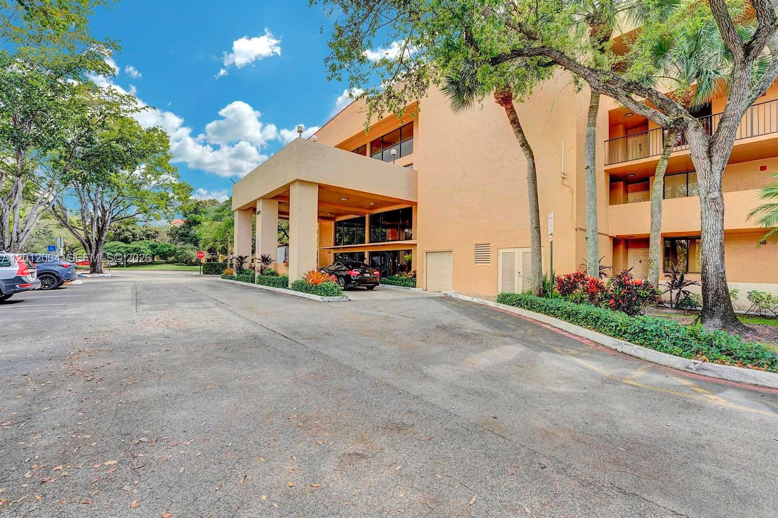 Welcome to the peaceful community of JACARANDA HEIGHTS in the heart of Plantation. This spacious condo offers over 1,000 sq ft of comfortable living, featuring a split layout with tile and laminate flooring throughout with ample natural light. 2 Generous Bedrooms with closets. 2 Full Bathrooms. Large, screened balcony perfect for relaxing with serene garden and lake views.  Washer and Dryer located conveniently in unit. Community has a Relaxing Clubhouse with Community Pool Well maintained common areas. Unbeatable Location Situated on Sunrise Blvd, nestled between Pine Island Rd and University Dr. You are minutes away from Plantation Walk, Broward Mall, endless dining, top rated schools, and parks. Easy access to major expressways (I-595/Turnpike). Perfect for First time homebuyers, downsizers, or a second home in sunny South Florida. Priced to Sell, Contact your broker today!