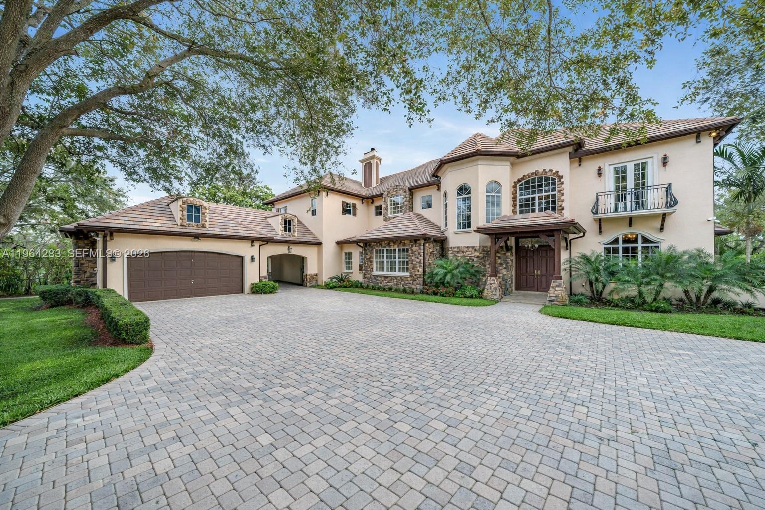 Exceptional Estate Property with Additional Acre, Barn & Future Potential.
Rare opportunity to own a beautifully maintained luxury residence situated on approximately two acres in a prime Miami location. This unique offering includes the main home plus an adjacent additional acre featuring a barn, providing a prime opportunity for new construction, with strong potential for a custom-built residence that could command a resale value of around $4.5 million in today's market. 
The residence features a grand double-height entry foyer with a sweeping staircase, abundant natural light, and spacious living areas designed for both everyday comfort and entertaining. The outdoor setting showcases a resort-style pool, covered terraces, lush landscaping, gazebo seating, and expansive green space ideal for relaxation or gatherings.
Conveniently located near major highways, shopping, dining, and schools, this property combines luxury living with land value, versatility, and long-term potential.