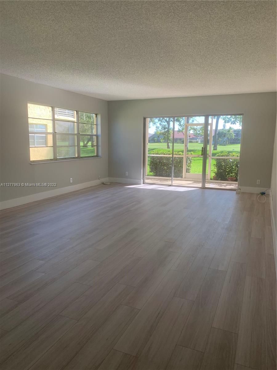 Incredible Golf Course Views from This Huge 1,790 sq. ft. Condo Unit, Featuring 3 bedroom, 2 full bath with all brand new floors and New baseboard throughout professionally painted. New heated pool and lots of parking spaces. Close to everything. Small dog and cat allowed. No lease 2 years. Cash.