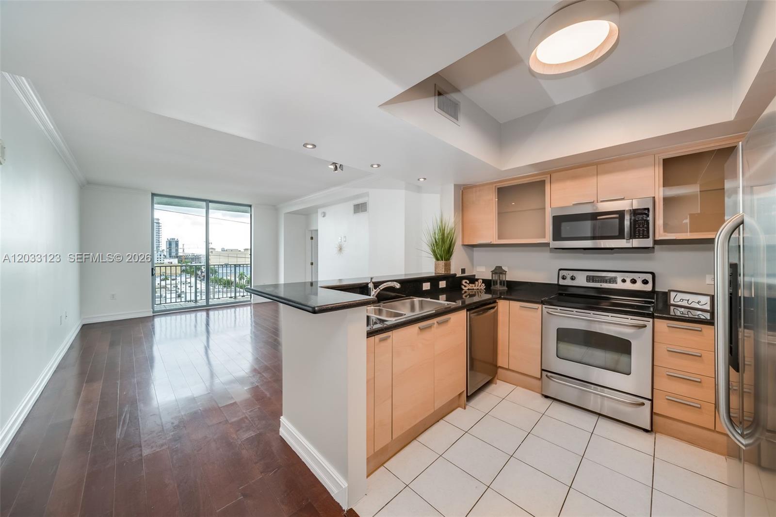 Amazing price to rent : 2-bedroom and 2-bathroom split floor plan with wood floors. Floor-to-ceiling windows in living and master bedrooms. 2 assigned garage spaces and granite counters with stainless steel appliances. The condo offers a 24/7 concierge front desk, on-site management, gym, pool, and valet parking at an additional cost. Located in Hollywood Downtown within walking distance to shops, restaurants, parks, markets, banks, and a 15-minute drive to Aventura. Also, only 5 minutes to the beach
