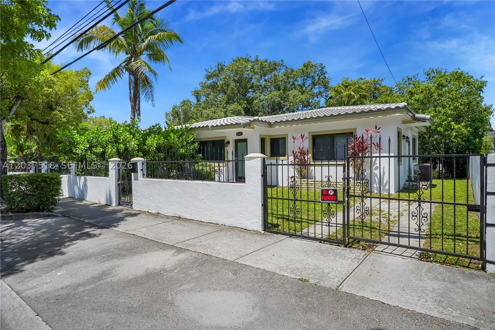 Live in Miami’s historic, highly sought-after MiMo district. This completely updated, spacious 3-bedroom, 2-bathroom duplex unit perfectly pairs mid-century character with sleek contemporary finishes, creating an ideal urban sanctuary for professionals. Fully secured by a crisp white perimeter privacy wall and a wrought-iron gate system, the property features dedicated, off-street parking. Premium impact glass windows run throughout, delivering fortress-grade security and a pin-drop quiet interior. Step outside into a massive, private tropical yard wrapped in mature foliage—a lush, pet-friendly paradise perfect for entertaining. Inside, the sprawling open-concept living area boasts modern wood-look flooring and recessed lighting. The chef’s kitchen features custom wood cabinetry, a large pantry tower, vibrant mosaic tile backsplashes, granite countertops with a breakfast bar, and stainless-steel appliances. Bedrooms are bright and spacious, including a versatile 3rd bedroom that is easily convertible into a dedicated home office. Live steps from the Biscayne Boulevard corridor, renowned for its curated boutique dining, local coffee shops, creative studios, and art scene. With its optimal proximity to downtown, the Design District, Wynwood, and the beaches, this property stands as the ultimate, secure rental sanctuary in Miami's most sought-after live-and-work neighborhood. Schedule a viewing today!
