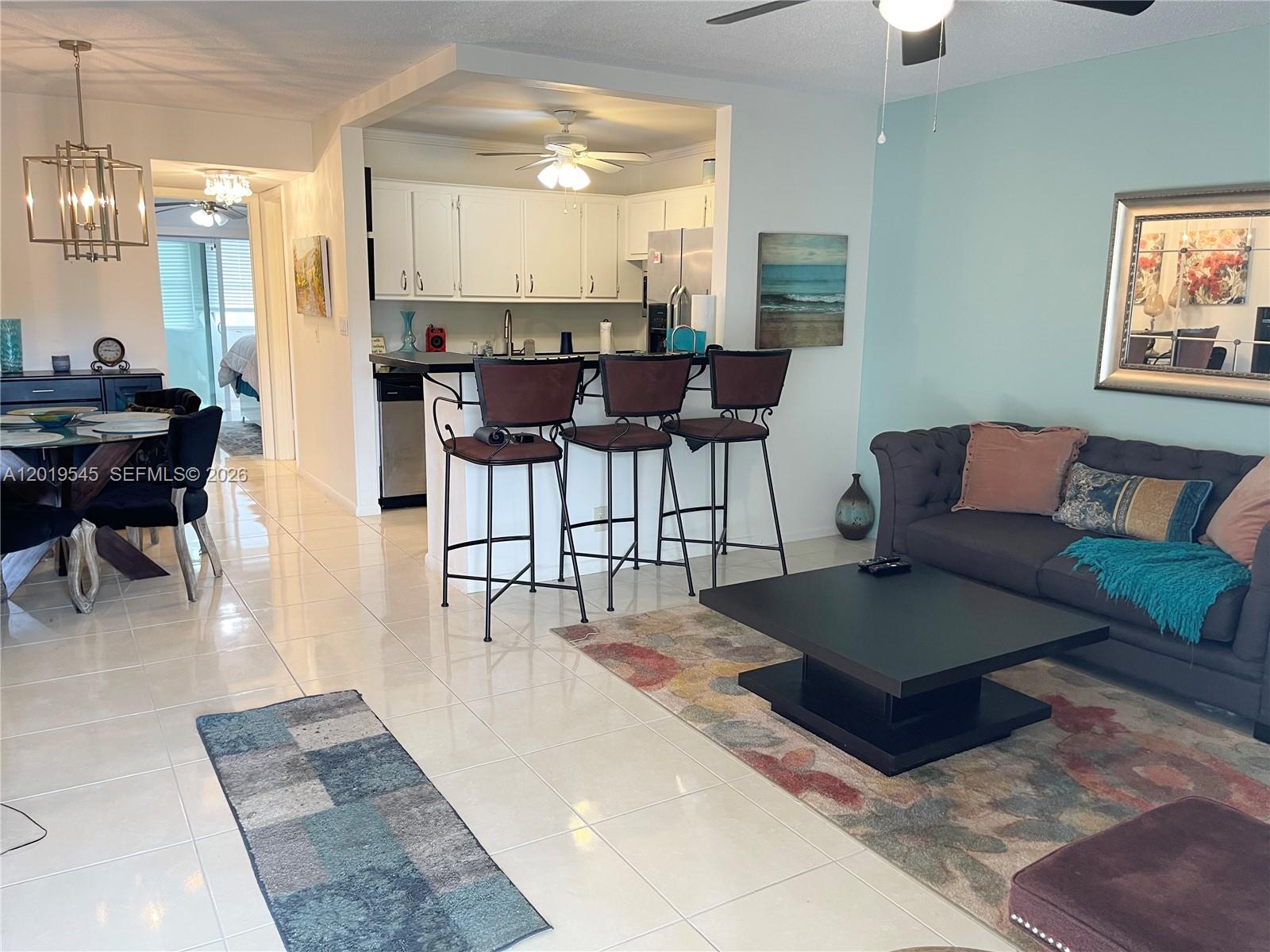 Beautiful 1-bedroom, 1-bath condo in the desirable 55+ community of Century Village featuring ceramic tile floors, granite countertops, stainless steel appliances, and newer A/C unit installed. Residents enjoy resort-style amenities including a 92,000 sq. ft. clubhouse with theater, fitness center, library, billiards, activity rooms, indoor pool, sauna, on-site medical center and more. Outdoor amenities include multiple pools, tennis, pickleball, shuffleboard, bocce ball, sailing, and kayaking. Free community buses provide transportation to shopping, restaurants, and medical facilities. Gated community with 24-hour security, conveniently located near the Florida Turnpike, I-95, and Palm Beach International Airport.