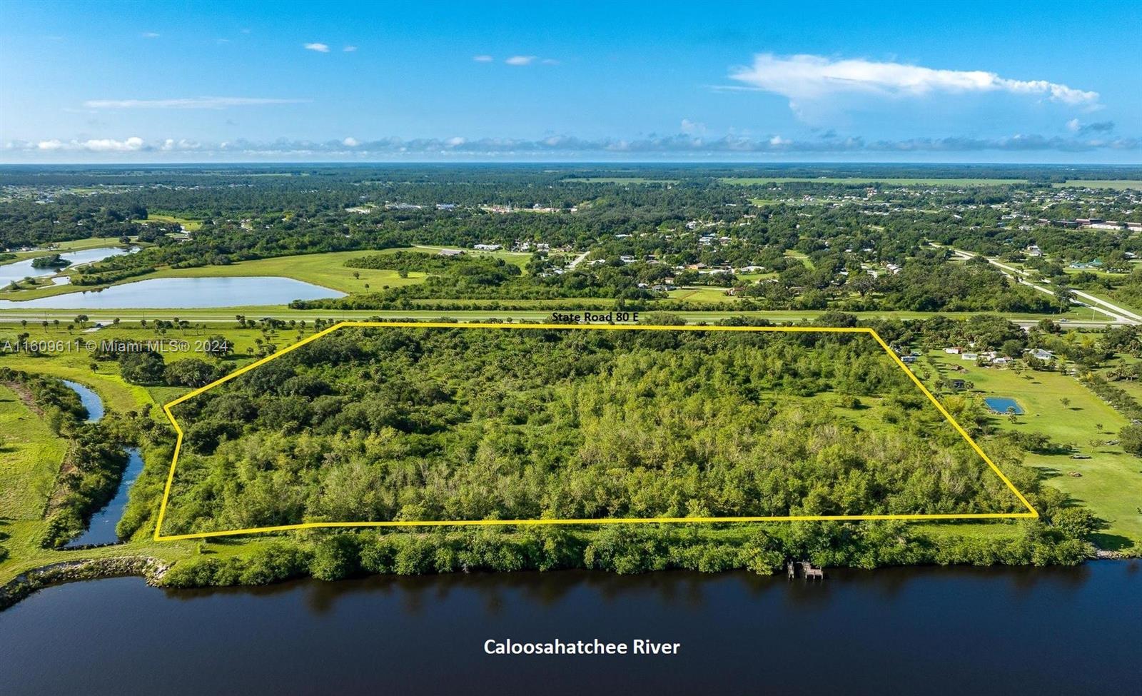 A DEVELOPER/INVESTOR'S DREAM PROPERTY boasting 1100+/- FT on SR 80 just east of the City of LaBelle, FL and 900+/- FT on the intracoastal waterway, the Caloosahatchee River segment. This 31.47 acres is currently zoned agricultural with the benefit of an agricultural exemption for low taxes. Municipal water and sewer line availability must be checked with Port LaBelle Utilities. The Future Land Use is Western Oxbow Mixed Use which allows commercial, not only on SR 80, but would be encouraged on the river in the form of marinas, dining, accommodations, and recreational uses. Residential uses are allowed for 186 units with more a possibility. The Caloosahatchee River is situated between two locks for safety and is considered to be a "Safe Haven" for boaters during hurricanes.