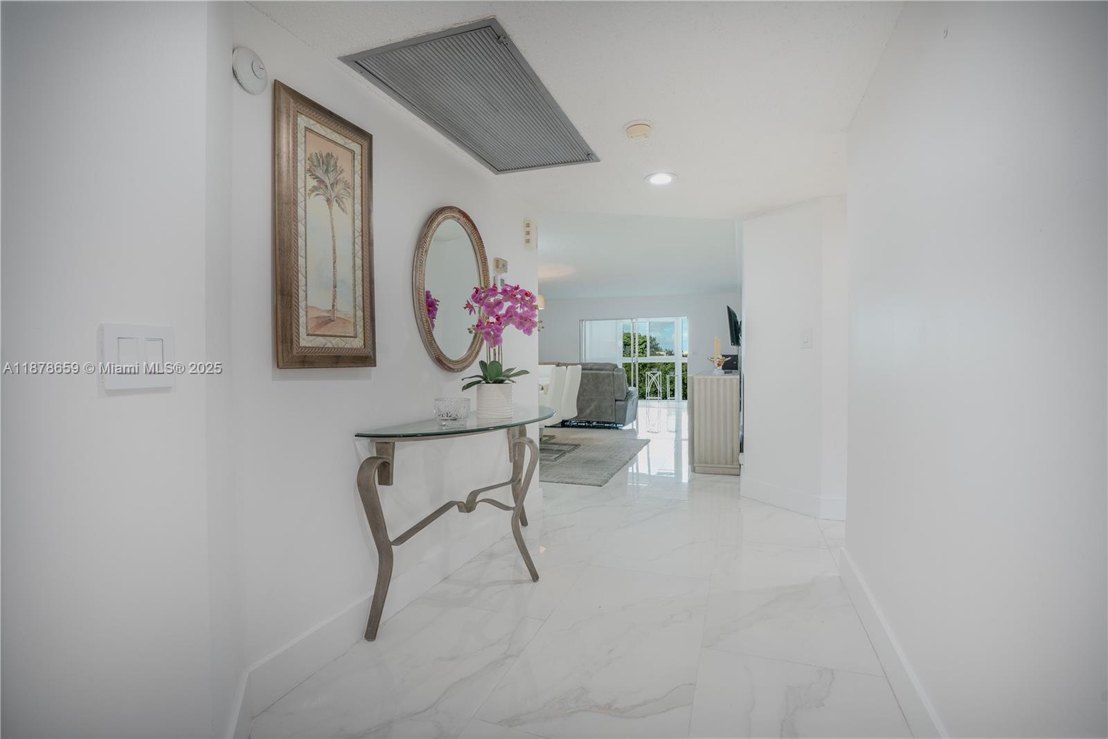 Penthouse floor unit in one of the best and more private 55+ communities in south florida, Wynmoor Residents. This unit is completely remodeled and updated. Porcelain floors throughout the entire unit, custom kitchen cabinets and quartz countertops. Open layout, natural light, custom shades in all of our Impact window, bathrooms are completely remodeled, stunning lake views, natural beauty, garden and tall trees views from every window of this beautiful apartment. Brand new appliances, washer and dryer . Built in closet, ceiling recessed lighting and modern light fixtures throughout the unit. The community offers world class amenities and a clubhouse with activities and recreational facilities and classes from Art, entertainment and more.