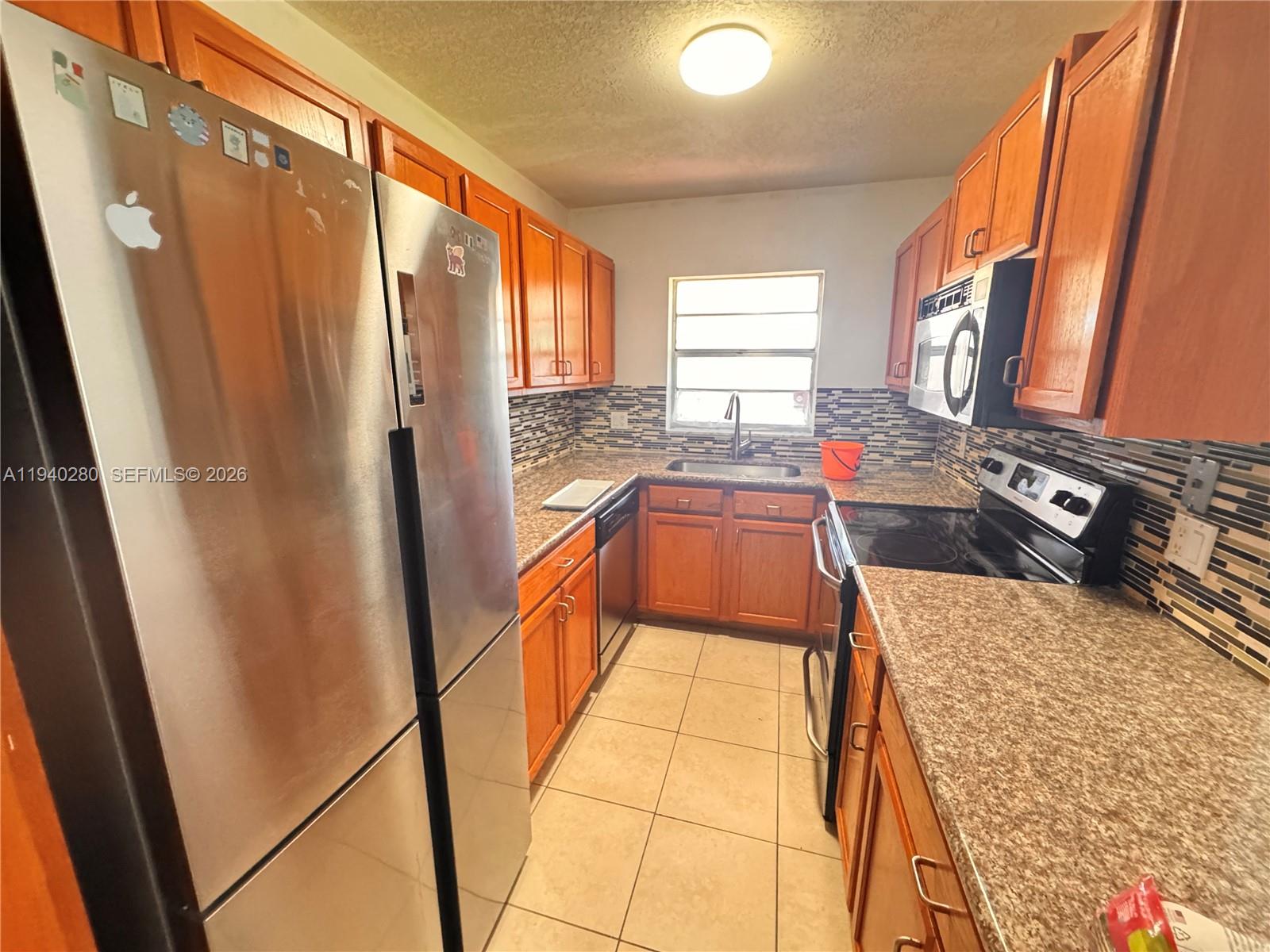 Move-in ready 2-bedroom, 2-bath condo in the heart of Boca Raton featuring a brand-new roof recently installed, offering peace of mind and long-term value. This bright and spacious unit boasts a well-designed split floor plan, abundant natural light, generous closet space, and a screened balcony ideal for enjoying the South Florida breeze. The well-maintained community offers a pool, clubhouse, and beautifully kept grounds. Prime central location just minutes from FAU, Boca Raton Regional Hospital, shopping, dining, major highways, and pristine beaches. Perfect for a full-time residence, seasonal getaway, or investment opportunity.