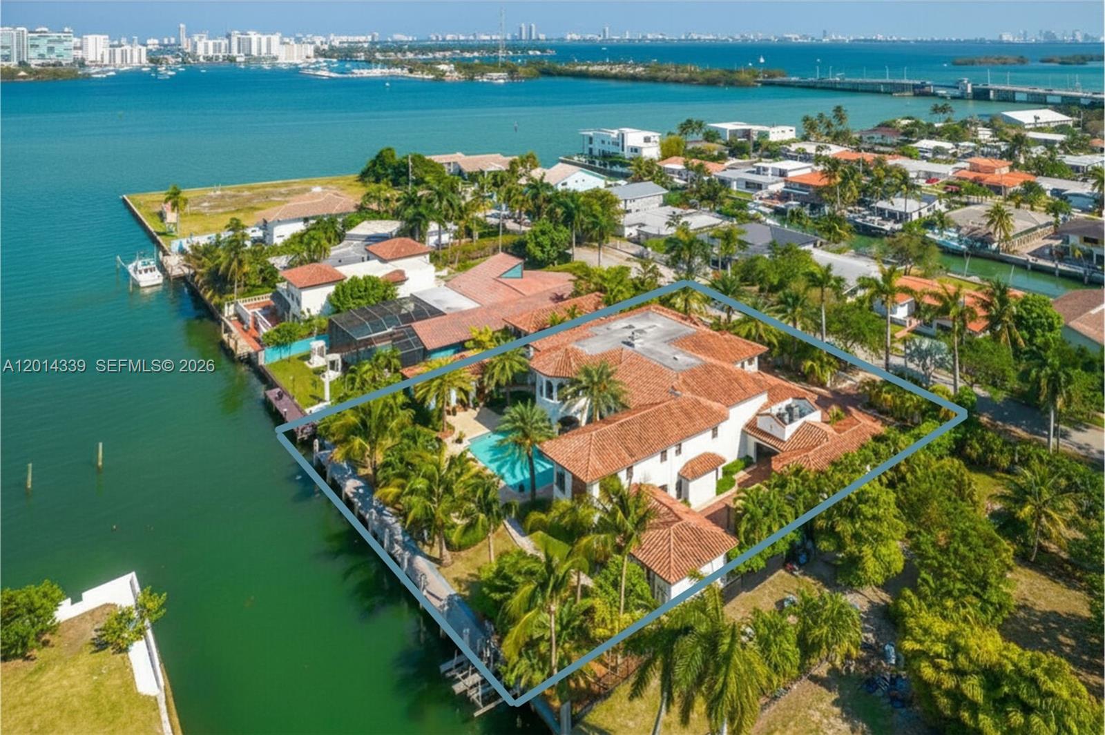 Experience luxury waterfront living in this Mediterranean-style estate offering 140 feet of waterfrontage with direct
open bay access. The home welcomes you with dramatic 25-foot ceilings in the main living room and features an
expansive 10-bedroom, 9.5-bathroom layout designed for both comfortable living and entertaining. The spacious
primary suite includes a sitting area, walk-in closet, separate shower and soaking tub, and two private balconies
with beautiful water views. A gourmet kitchen with a large island and double appliances flows seamlessly into the
informal living area and formal dining room, while additional living spaces provide plenty of room to relax or host
guests, including a lounge currently set up with a pool table. Outdoors, enjoy a resort-style setting with an
expansive pool, cabana, and summer kitchen perfect for alfresco dining and entertaining. The property also
features a charming 2-bedroom, 1-bath guest cottage, a 4-car garage, and sits on an oversized lot with direct
access to Biscayne Bay and the ocean, making it an exceptional opportunity for waterfront living and boating
enthusiasts.