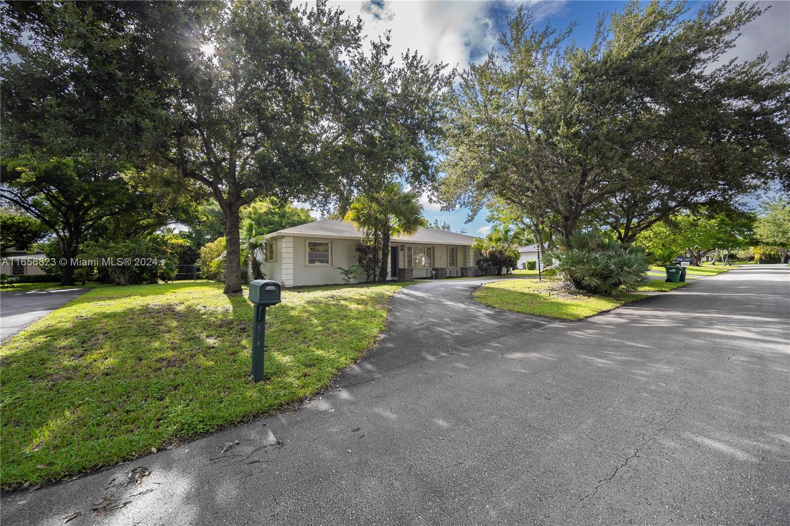 Discover the potential of this spacious 4-bedrm, 2-bath home, perfectly situated in a serene neighborhood. With a formal living rm, dining rm, and family rm, this property provides ample space for both entertaining and daily living. The large kitchen, featuring a cozy breakfast nook, is designed for comfort and convenience. An additional room with a private entrance offers versatility, ideal for a home office or creative space. Enjoy year-round outdoor living with a screened swimming pool & a generous lot of under 1/2 an acre. The back garden, facing a quiet cul-de-sac, ensures maximum privacy. Located near The Falls shopping center and with easy access to major roads, this home combines convenience with the potential to become your dream residence. Seize this opportunity to make it yours