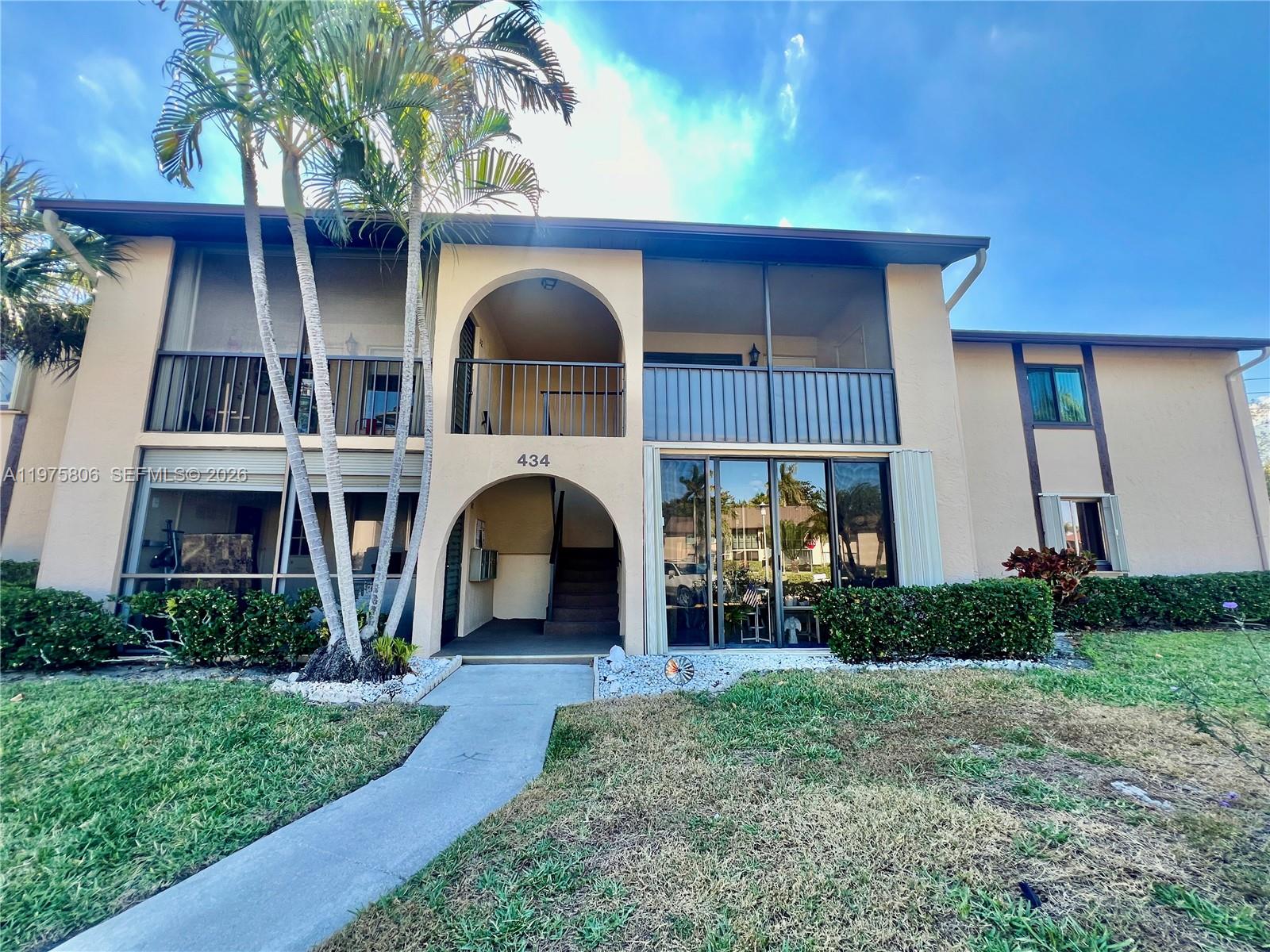 Unapproved short sale, motivated sellers. Process under way, please allow minimum 30 days for approval.  BRING OFFERS! Don’t miss this one! A wonderful opportunity to own a beautifully maintained 2-bed/2-bath condo in a fantastic location. 
Step inside to an open-concept living space that seamlessly connects the living room, dining area, and kitchen. Enjoy an oversized screened-in porch, perfect for relaxing or entertaining, plus the convenience of an in-unit washer and dryer.
This immaculate residence offers abundant storage, including walk-in closets in both bedrooms, a spacious laundry/utility room, and an additional storage closet on the front porch. Basic cable is included through the HOA.
This activities-packed community features a heated pool, shuffleboard, bocce ball, a clubhouse, car wash area, and a lakeside walking path. You’re just a short walk from all amenities and minutes from endless dining and shopping options—20 minutes to the beach and 10 minutes to the Turnpike.
A one-year rental restriction applies.
Call today to schedule your private tour and make this beautiful home yours
