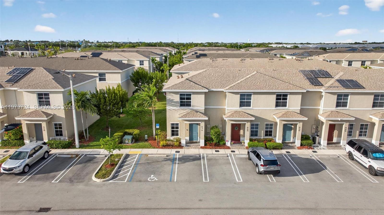 BEST PRICED Townhome in the area! Why overpay on new construction when you can enjoy this spacious two-story corner townhome in the desirable Keys Pointe community featuring 2 bedrooms and 2.5 bathrooms. This bright and comfortable home offers two assigned parking spaces right in front of the unit and a private fenced patio, perfect for relaxing or entertaining. The modern kitchen with stainless steel appliances and in-unit washer and dryer add everyday convenience. Residents enjoy resort-style amenities within walking distance, including a pool, gym, and basketball courts. Ideally located just minutes from the Florida Keys, Florida Keys Outlet Marketplace, US-1, Florida’s Turnpike, shopping, dining, and schools, this property is perfect for families, professionals, or investors seeking a low-maintenance lifestyle in a growing community. It's a MUST SEE! Owners have really taken care of this one. Call for a private tour today!