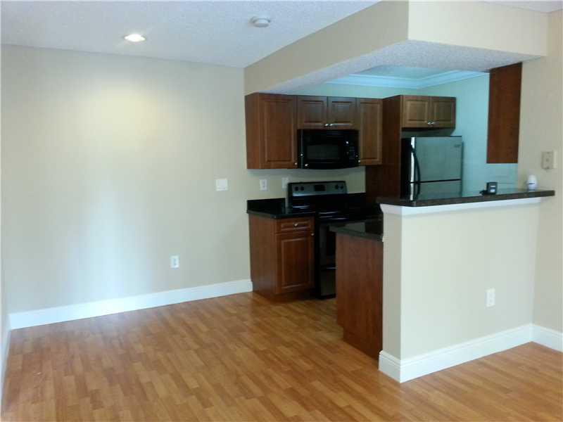 FULLY REMODELED AND UPGRADED 1 BED / 1 BATH WITH WOOD FLOORS; KITCHEN HAS GRANITE COUNTER TOPS AND STAINLESS STEEL APPLIANCES. GARDEN STYLE BALCONY VIEW WITH WASHER/DRYER HOOKUP IN CLOSET.  MOVE-IN READY.  SECURE, GATED COMMUNITY