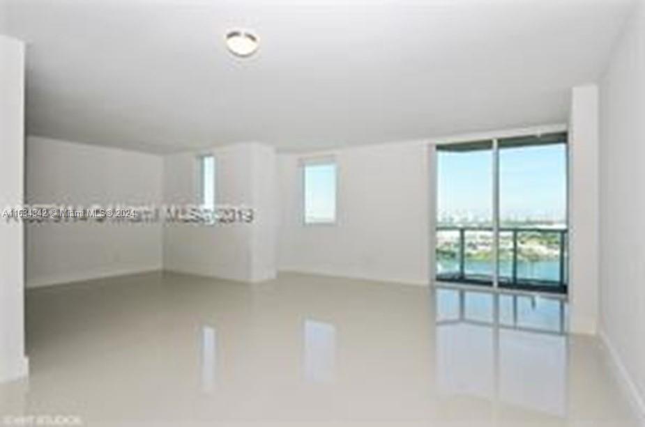 Beautiful Views, 2 bedrooms, 2-1/2 bathrooms with 2 balconies. White porcelain floors throughout the unit. Kitchen with black granite counter top opens to living and dining room. Very big layout 1474 sf. This unit have a storage. Great amenities, includes 4 pools, gym, spa, club room with pool table and kitchen, sundeck, business room, theater and more. Location is perfect, near Bayside Marketplace, museums, opera house, restaurants, Whole Foods and Brickell area.
