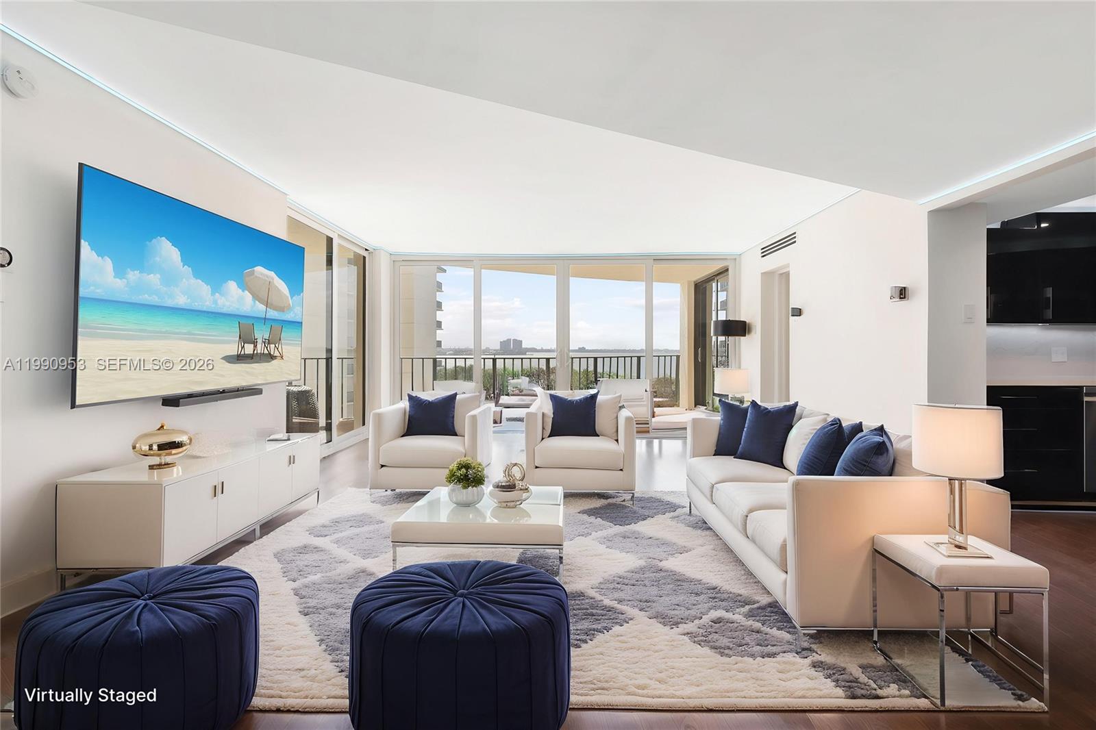 Completely remodeled oceanfront gem with breathtaking views of the ocean and intercoastal! Welcome to luxury coastal living at its finest. This stunning 2 bedroom 2 bathroom residence at the prestigious Connemara has been fully renovated from top to bottom - no details overlooked! Enjoy panoramic ocean and intercoastal views from every room, along with two private balconies that overlook the sparkling pool.  Step inside to find a modern open-concept layout featuring a brand-new designer kitchen, spa-inspired bathrooms, sleek new flooring, and custom lighting throughout.  The unit also boasts custom closets, a stylish wine bar, and state-of-the art appliances- making it truly move-in-ready! A washer/dryer can be installed in the unit.  Whether you're seeking a full-time residence, vacation getaway, or smart investment, this residence will be ideal!