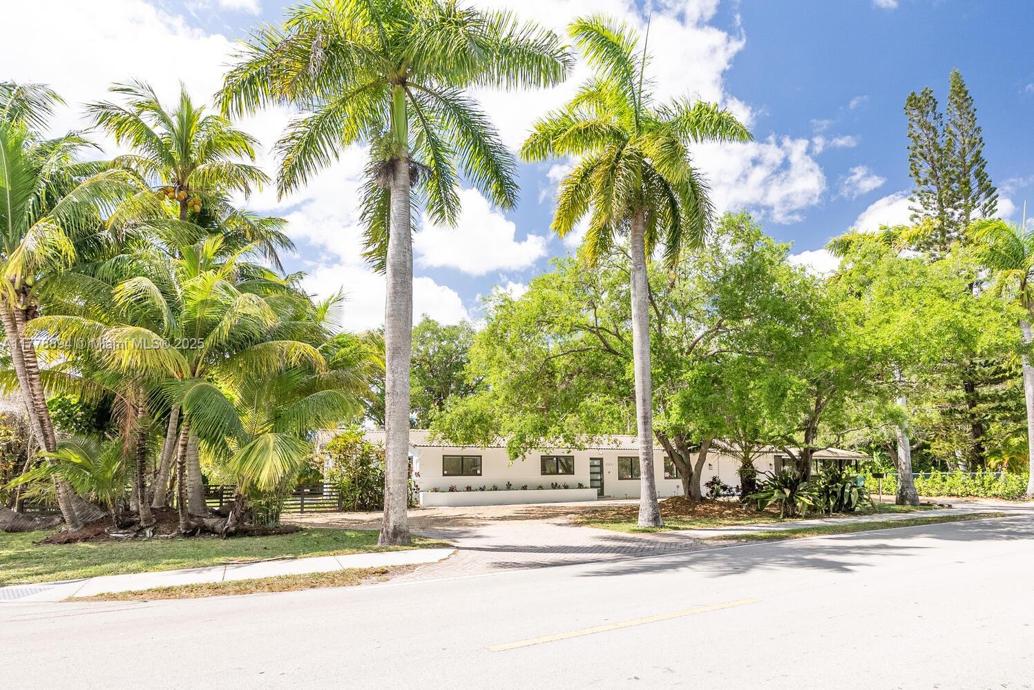 Stunningly Remodeled 4-Bedroom Home in Prime Pinecrest Location
Welcome to this beautifully renovated 4-bedroom, 3.5-bath residence nestled in the heart of Pinecrest. The home offers a newly renovated kitchen with quartz countertops, new bathrooms with entirely new plumbing, new porcelain tile floors, new impact windows and doors, smart sprinkler system, instant water heaters, smart lighting system, and much more. The outdoors features a heated, screened-in pool with ample cover terrace plus a large multi-purpose sun room, for endless entertainment options. All this surrounded by lush landscape, in a highly sought after school district. Schedule your visit today!