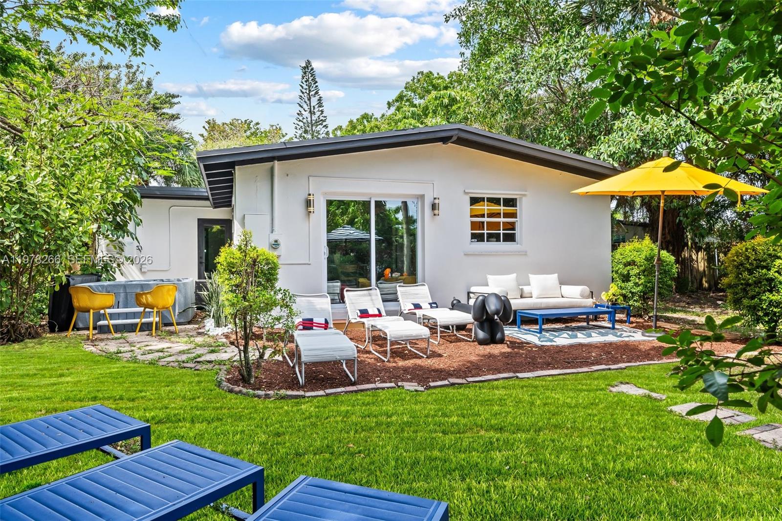 Soho House–inspired private retreat, completely renovated and designer furnished. This 3BD/2BA home features a modern European kitchen with quartzite (natural high-end stone) countertops, and elegant European furnishings throughout. Enjoy a lushly landscaped, fully fenced large backyard with grill, alfresco dining, and 8-person spa, perfect for relaxing or entertaining. Plenty of room for a pool. 

Located in a quiet, private enclave with unbeatable access, under 5 min to I-95, 10 min to FLL Airport, Las Olas and Hard Rock Casino, 15 min to Fort Lauderdale Beach, and minutes to Brightline.

Short-term rentals allowed, making this a fantastic investment opportunity, vacation home, or private residence in a prime central location.