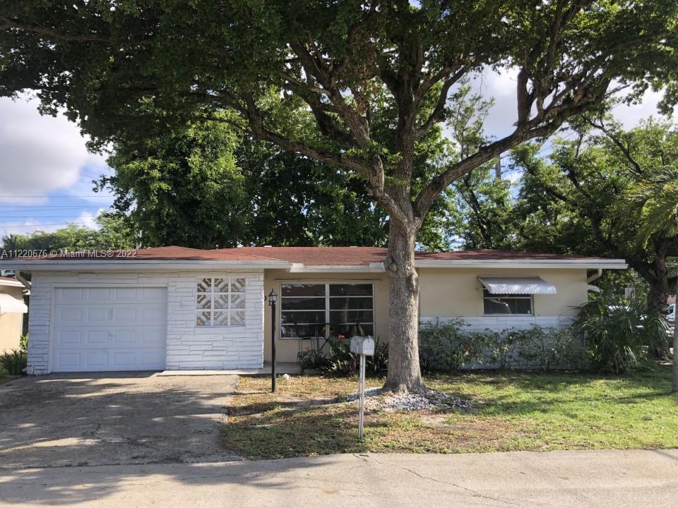 Beautifully maintained and updated 2 bedroom 2 bathroom home located on a large corner lot in Crystal Lake Golf Villas, Deerfield Beach! Updated kitchen with new cabinets, granite countertops and stainless steel appliances. Updated bathrooms. Newer AC. Large open living area with nice tile floors, new carpets in bedrooms, new vinyl floors throughout kitchen and bathrooms. One car garage with laundry room including washer and dryer. Bright spacious Florida room with retractable shutters. This property is only minutes away from the beach, surrounded by golf courses and a short drive to Sawgrass Mills mall, Butterfly World and more! Low HOA includes cable, lawn and pest control services, exterior painting (every 5 years), and access to irresistible community areas - pool, jacuzzi, gym,