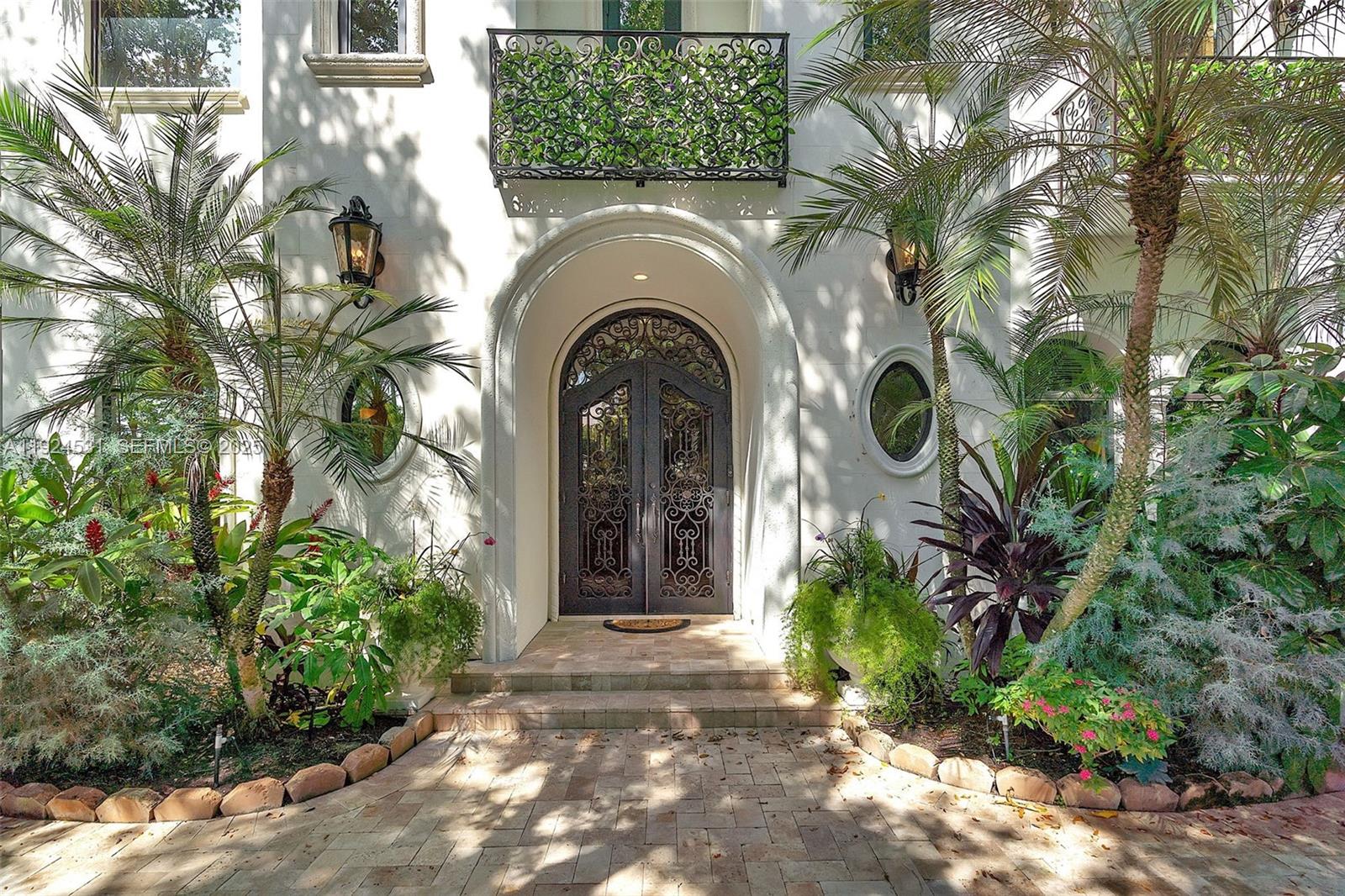 RANDALL STOFFT DESIGNED MEDITERRANEAN MASTERPIECE in Best Boca SANCTUARY. Brand new roof, Top of line impact new windows and doors! Brand new redesigned patio, lanai, fence, and lavish landscape design just completed!5-BEDROOMS, 5 FULL/2 HALF Bath, AND 6,100+ SF*Only 1/2 mile to the BEACH, one of the most exclusive gated communities in the country. 24 HR. SECURITY, Land and Water Patrols. Features a Grand Foyer, Private Elevator, Living Room with Soaring 24' Ceilings, and Formal Dining Room with Wet Bar. Spectacular Staircase leads to 4 Bedrooms with En Suite Baths, Media Room w/mini bar. Chef's Kitchen, Sub Zero, Gas stove, butler's pantry Master Bedroom Suite with Marble Bath, and Enormous Shower. Heated Salt Pool, Spa, and Summer Kitchen. Private Marina, tennis, and playground