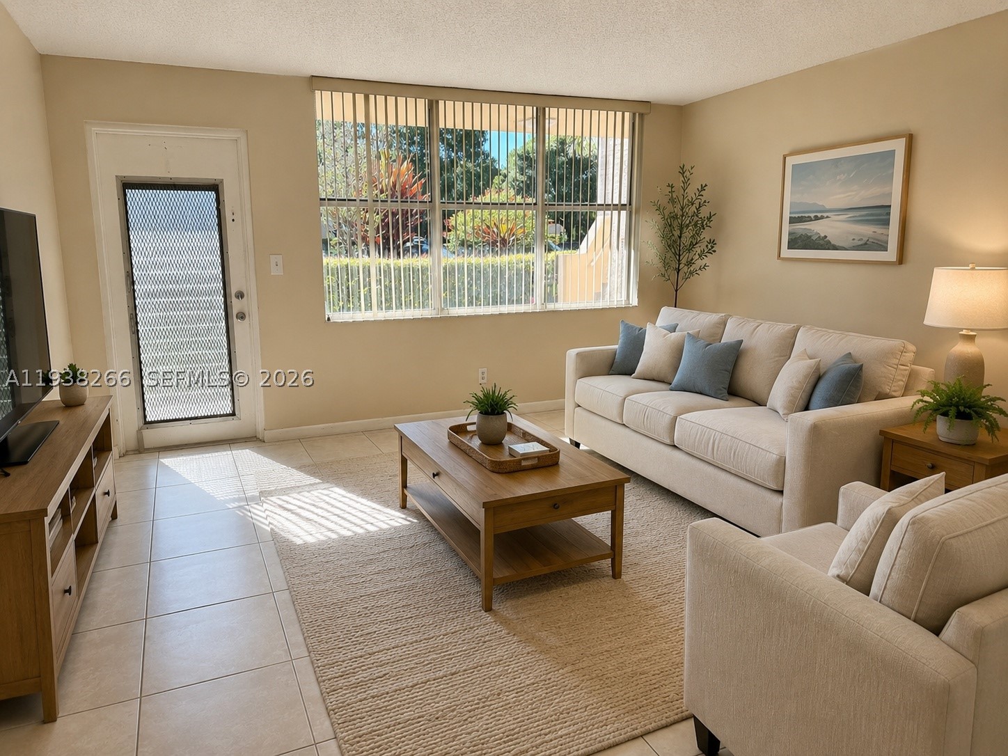 Enjoy COMFORTABLE and CAREFREE living in this well-maintained FIRST-FLOOR residence located in the HIGHLY DESIRABLE 55+ COMMUNITY of SUNRISE LAKES PHASE 3. This charming unit features TILE FLOORS throughout, and a SCREENED PATIO with a PEACEFUL VIEW and EASY OUTDOOR ACCESS. The GROUND-LEVEL location eliminates the need for STAIRS or ELEVATORS, offering true CONVENIENCE and ACCESSIBILITY. Residents enjoy an impressive array of RESORT-STYLE AMENITIES including OUTDOOR POOLS, a FULLY EQUIPPED FITNESS CENTER, BILLIARDS, CARD ROOMS, TENNIS and RACQUETBALL COURTS, and access to a SCENIC 9-HOLE GOLF COURSE. The ACTIVE CLUBHOUSE hosts regular COMMUNITY EVENTS, CLASSES, MOVIES, and SOCIAL GATHERINGS that foster connection and enjoyment. Public transit is easily accessible via the BROWARD COUNTY BUS ROUTE and the CITY-RUN SUNRISE FREEBEE on-demand electric shuttle. The ASSOCIATION requires a 6-MONTH MAINTENANCE DEPOSIT held for one year post-closing. NO PETS and NO LEASING are permitted. This is an EXCELLENT opportunity for someone seeking a SOCIAL, SECURE, and WELL-CONNECTED lifestyle in a BEAUTIFULLY LANDSCAPED SENIOR COMMUNITY.  HOA Requires 6 months in escrow.  *Some photos have been digitally enhanced, including AI-generated twilight effects, and staging for marketing purposes only*