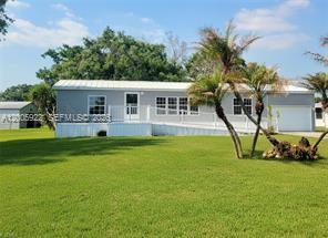Located in one of the nicest neighborhoods in Lakeport with a community boat dock almost directly across the street! This nicely maintained three-bedroom two bath home, features an open floor plan, metal roof, garage, and a huge 14 x 41 screened lanai! This is perfect for a weekend getaway, fishing retreat, or just enjoy living in a quiet community with easy access to fantastic fishing!