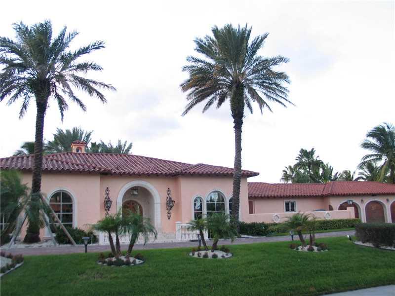 PRICE REDUCED MOTIVATED OWNER ! Brand new Roof. Over 3 million Invested.Magnificent private compound, 2 Pristine acres & 400 ft frontage on the woodlands golf course, 50 person spa w/fountain,large pond, lighted tennis court. His and her master spas.  Media rm, 50' heated pool. Hand carved mohagony doors throughout, imported tile floors handcrafted in Spain, Portugal and Italy.sun deck,lush tropical landscaping and waterfall. 2 Loggias 800ft of privacy walls.3 Car garage.An absolute showpiece.