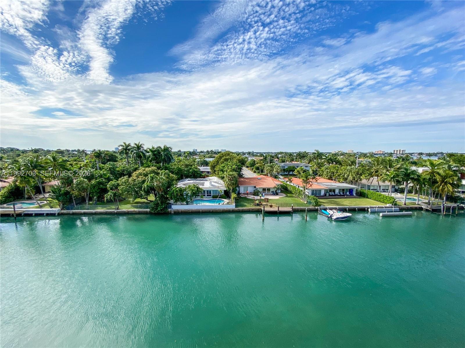 Calling all boaters! Unique opportunity to buy a 1 bedroom 1 1/2 bathroom condo in Bay Harbor Islands that comes with a 24' PRIVATE BOAT DOCK, with no fixed bridges to the intracoastal for a smooth and quick ride to the ocean. The condo has beautiful bay views facing west offering gorgeous sunsets. This waterfront building has just gone through a major renovation adding a new seawall, dock, complete replacement of roof, elevator modernization, new impact resistant windows and new glass balconies. This property comes with private storage, and assigned parking space. Welcome to the beautiful waterfront community of Bay Harbor Islands.*** Any balcony photos are now new glass panels***