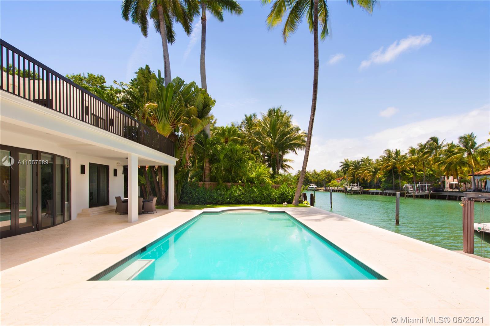 Located in the highly exclusive Sunset Island, this impeccably designed waterfront is your next turnkey destination. You will find yourself in an oasis filled w/beautiful scenery around the corner of the dynamic Sunset Harbour lifestyle. Every detail of this home was reconstructed to a perfect balance between Modern & Deco. Main floor features a spacious living room w/vaulted ceilings that leads to the pool & boat dock. State of the art media room for those comfortable movie nights & 2BR w/large bathroom also downstairs. Master bedroom on the 2nd floor opens to the terrace where you can enjoy sun all day & another large ensuite bedroom. Wood flooring throughout, custom designed kitchen w/Miele appliances, custom closets by Innerspace & electronic blinds, make this Smart Home easy to enjoy.