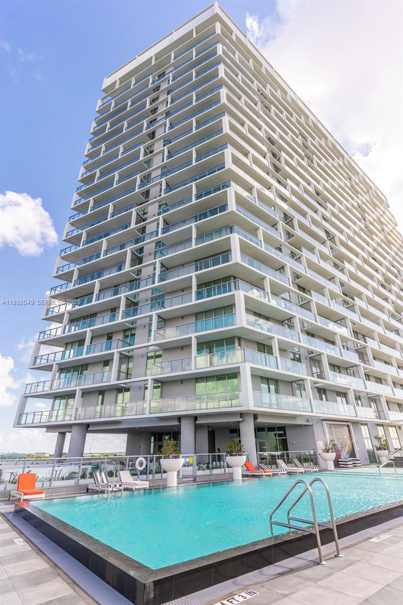 Experience luxury living in this stunning 3-bedroom, 3-bath residence at Metropica. Featuring elegant finishes, custom furnishings, and a spacious open layout that leads to a massive private balcony with breathtaking city and sunset views. Sold fully furnished for a true turnkey lifestyle. Enjoy a gourmet kitchen with premium appliances, floor-to-ceiling windows, and spa-inspired bathrooms. Metropica offers resort-style amenities including a pool, fitness center, tennis courts, spa, sauna, children’s playroom, club room, and 24-hour concierge.