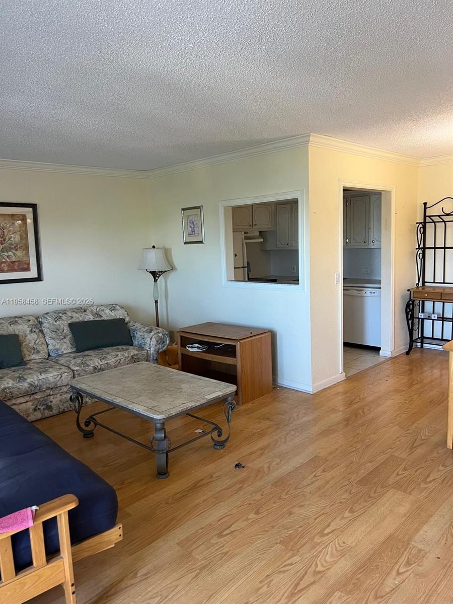 Well-maintained 1-bedroom, 1.5-bath condo offering 720 sq ft of comfortable living in desirable Century Village Boca Raton. Features laminate flooring throughout and central A/C. Enjoy an active lifestyle with resort-style amenities including a fitness center, billiards room, art studio, 17 outdoor pools, one indoor pool, tennis, pickleball, and shuffleboard courts, plus convenient internal and external transportation. Ideally located in West Boca Raton, just minutes from shopping malls, grocery stores, restaurants, and everyday conveniences.