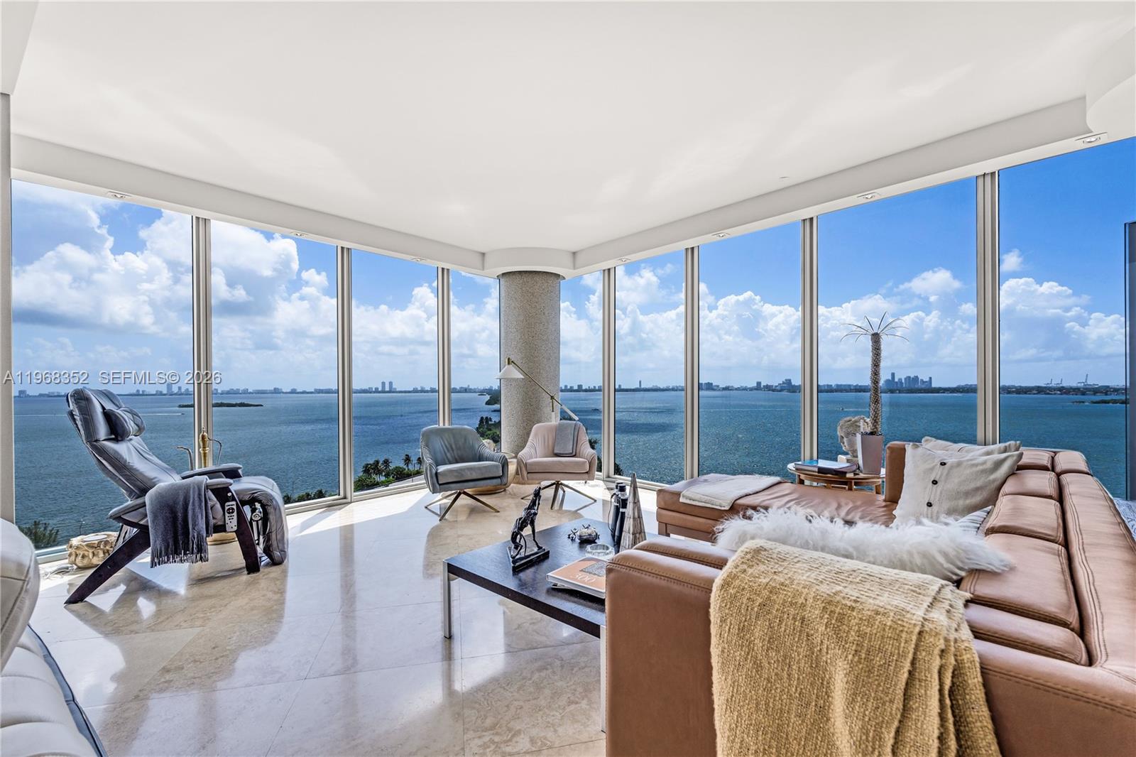 Wake up to breathtaking, unobstructed Biscayne Bay views from Blue’s premier high-floor corner residence—an exceptional 2BR/2.5BA home offering 1,870 SqFt of light-filled living framed by floor-to-ceiling glass. Endless water vistas and radiant sunrises define this beautifully renovated space, featuring a gourmet kitchen, architectural recessed lighting, motorized shades, spacious custom built-in closets, and a serene primary suite retreat. Two new AC systems provide modern efficiency and comfort. A rare offering in the building, the residence includes two oversized side-by-side assigned parking spaces, one valet space, and two private storage units—an uncommon advantage for this prime line. Strategically positioned as one of the most attractive opportunities for a premier corner residence at Blue Condo, this home delivers exceptional value for its size, views, and upgrades. The building features fully funded reserves, no special assessments, and premier amenities including a semi-private elevator foyer, two resort-style pools, a state-of-the-art fitness center with sauna, media lounge, BBQ area, party room, dog park, and more. A sophisticated, design-forward lobby transformation—fully permitted by the City—is set to begin shortly, elevating the building’s arrival experience and long-term appeal. Ideally located in the heart of Edgewater, steps to Midtown and the Design District, and minutes to Miami Beach, Brickell, and Miami International Airport.