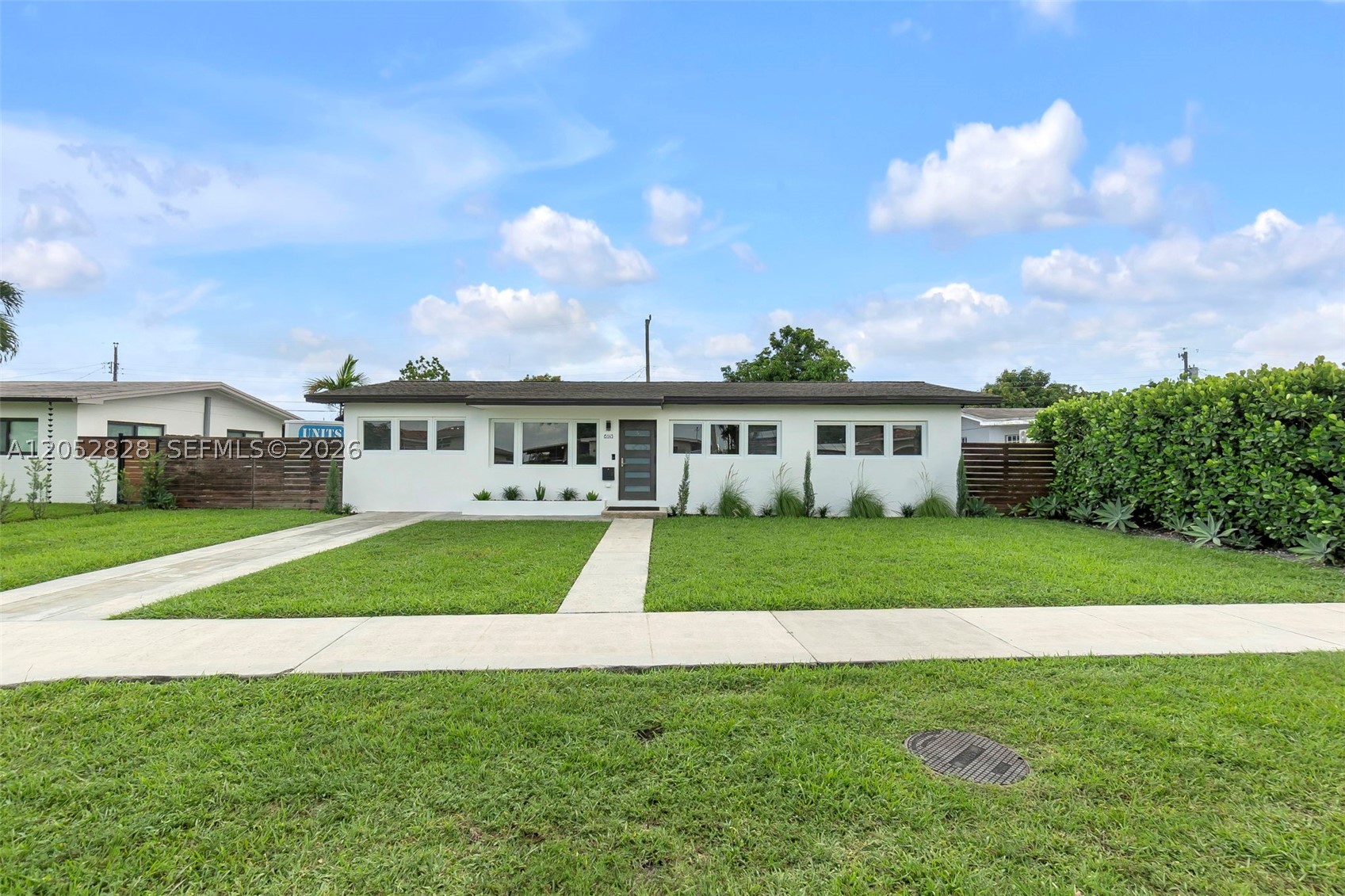 Exceptional Move-In Ready Home - Completely Remodeled!** Discover this beautifully renovated 3-bedroom, 2-bath single-family home with an additional den, conveniently located west of Hialeah. Interior features include updated flooring throughout, impact-resistant windows and doors, remodeled bathrooms, and modern interior doors. The functional floor plan offers versatile living space, while the den provides flexibility for a home office, additional room, playroom, or guest area. The backyard is ideal for outdoor entertaining, family gatherings, or everyday enjoyment. A well-maintained property with quality updates throughout, ready for its new owner.