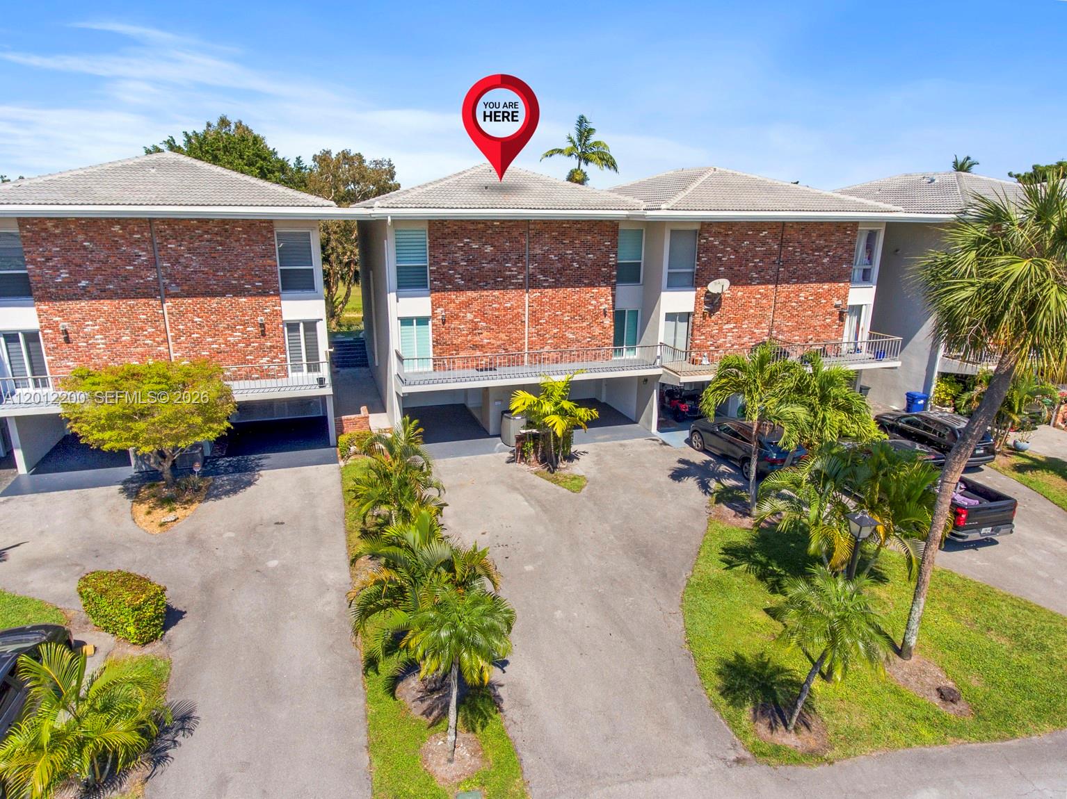 Very Unique opportunity to own the largest Townhouse in the Country Club of Miami area. This property has breathtaking views overlooking the Country Club's soon to be renovated sprawling golf course. New Roof, Impact Windows, Marble floors throughout & New Master Bathroom are some of what this beautiful multi level townhouse have to offer. Property is the largest of only two original double folio units. Short walk or ride your private golf cart to the Club House, Driving Range, Golf course or Tennis courts. HOA includes Security and Property Insurance. Please call for more information and to schedule a showing.