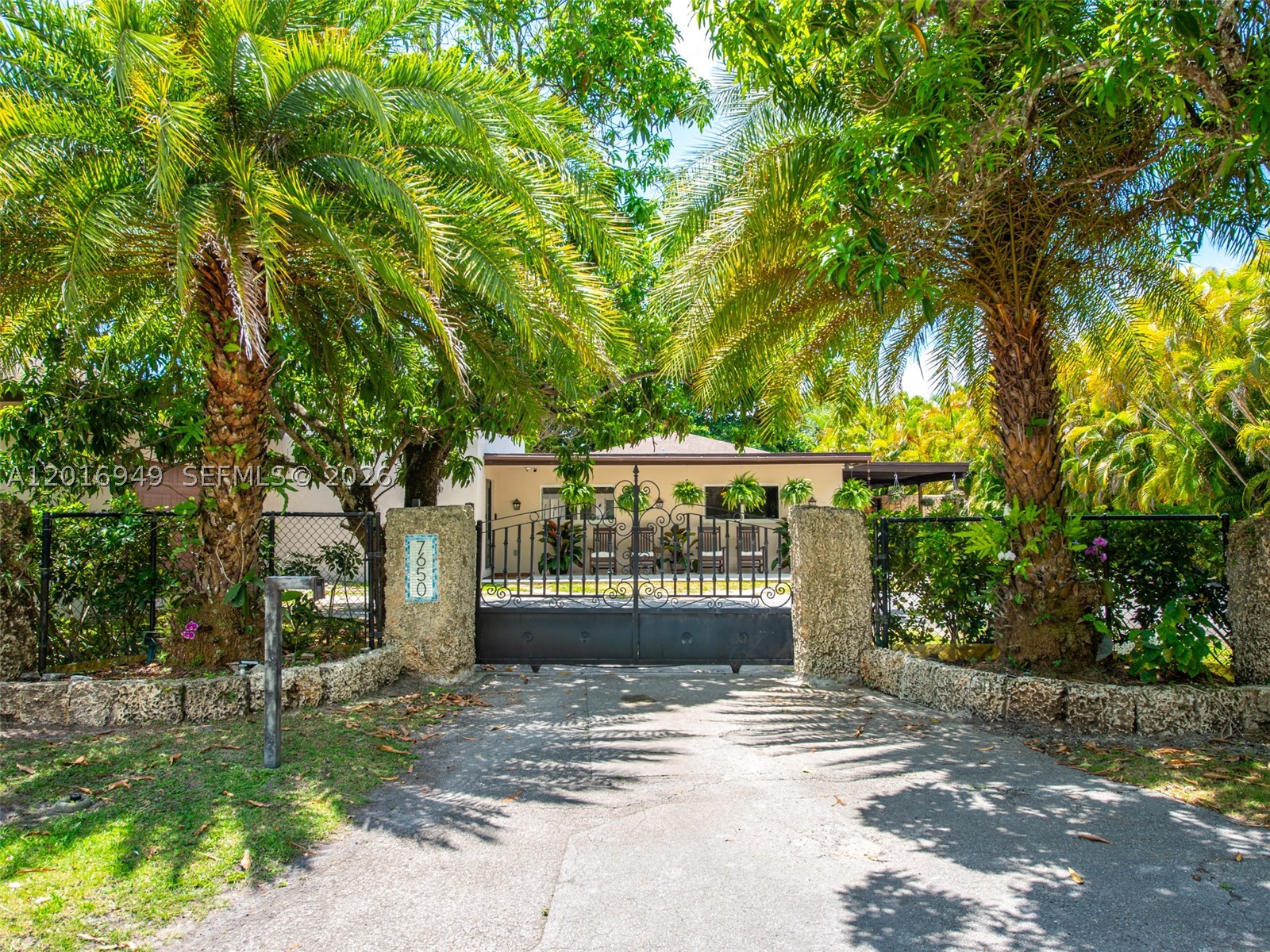 An iconic mid-century modern masterpiece by legendary architect Kenneth Treister, this one-of-a-kind 6-bedroom + den/office, 6-bath estate is a true living work of art in the heart of Pinecrest. Completely walled and gated, the property offers exceptional privacy and security across a sprawling 33,000 SF lot. The home showcases Treister’s signature architecture with soaring wood ceilings, walls of glass, sculptural details, striking water features, and a seamless connection to the lush tropical surroundings. Recently renovated with high-end finishes, the home features a stunning chef’s kitchen, impact glass throughout, expansive entertaining spaces, a resort-style pool, outdoor Chicago brick fireplace, and a massive 2.5-car garage. Bold, artistic, and completely unforgettable.