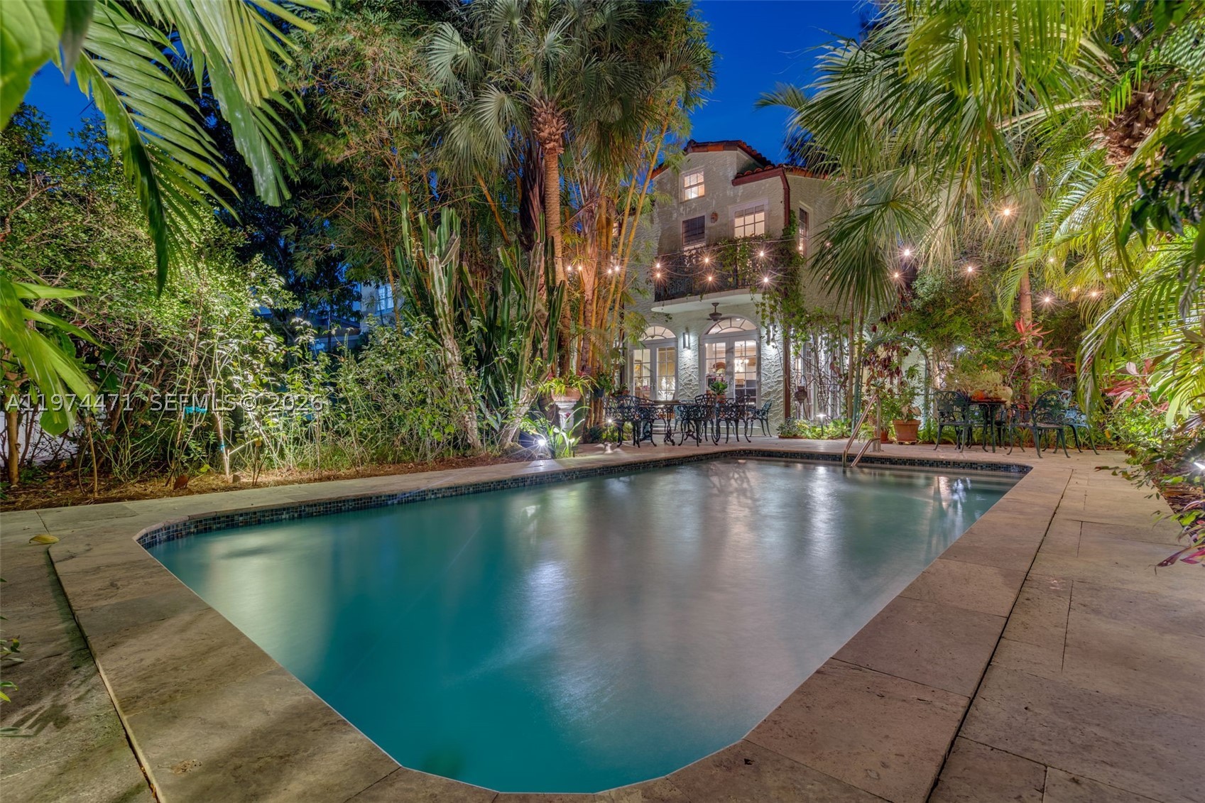 Inspired by early Miami Old Spanish architecture, this modern estate integrates the best of old-world soul with heavy-duty engineering. While public records state 1925, the estate functions as modern construction following massive ground-up structural reconstructions spanning 1999 to 2023. Perched 16ft above sea level in a preferred X Flood Zone (no insurance required), it features full impact glass, concrete-reinforced expansions, and 400-Amp industrial power. Total estate footprint includes 3,090 SF main home + detached multi-use guest cottage + climate-controlled garage w/ Tesla charger + expansive terrace equalling 4000 sq ft of living space. Meticulously updated (Roof 2018, HVACs 2023, Plumbing/Electric overhauled), the interior marries contemporary high-end finishes with historic warmth. Complete with a sparkling pool and lush, pesticide-free native gardens, this private Coconut Grove oasis is engineered to stand for another century. True reconstruction timeline available in attachments.