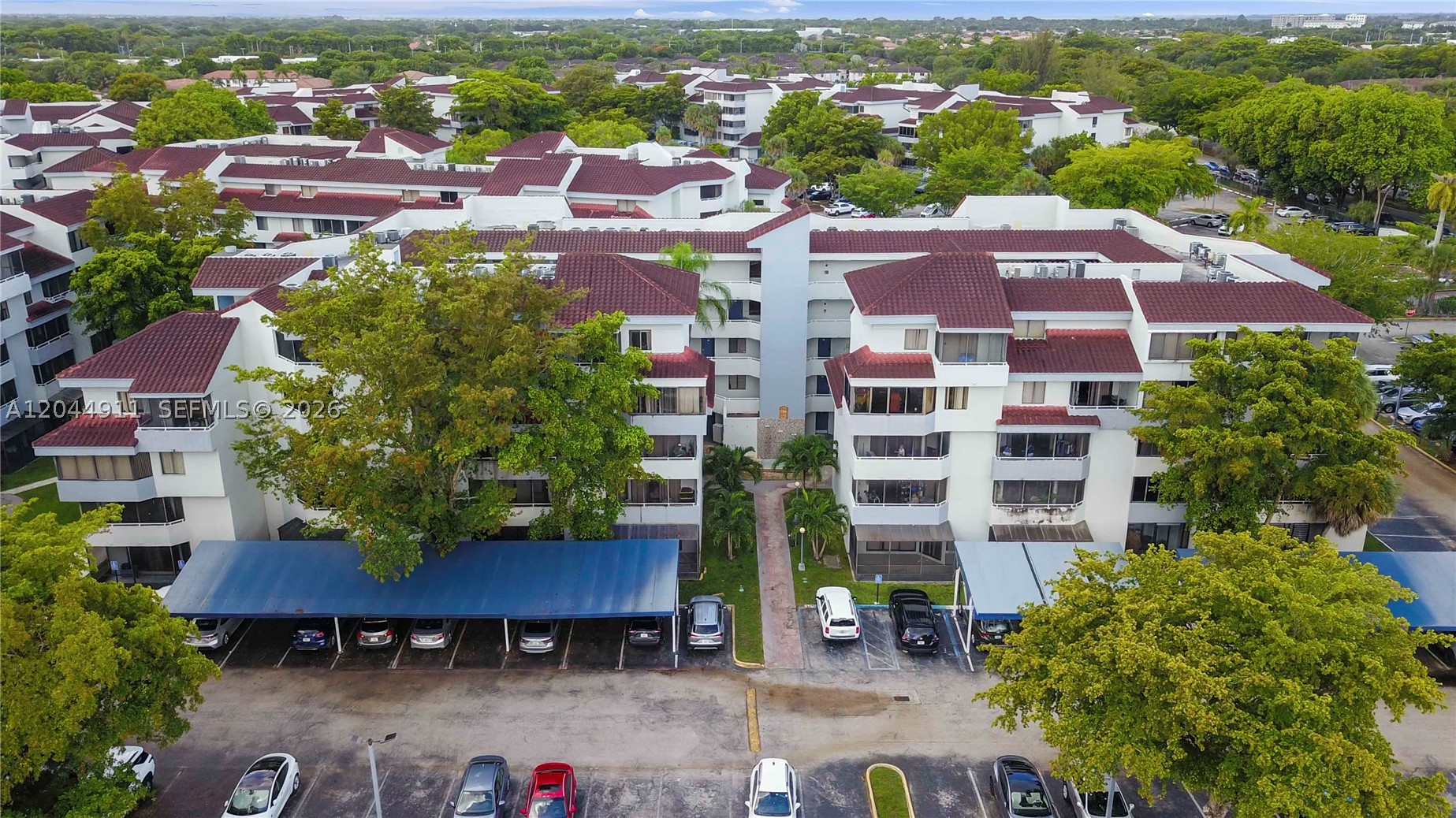 Ideally located in the heart of Kendall, this well-maintained ground-floor 1-bedroom, 1-bathroom unit offers comfort and convenience. Features include a spacious balcony and an in-unit washer and dryer. Enjoy a prime location directly across from beautiful parks and a lake, just minutes from shopping, restaurants, hospitals, major expressways, and public transportation, with a bus stop conveniently located in front of the community. Residents have access to excellent amenities, including a swimming pool, fitness center, and playground, as well as highly rated nearby schools. Vacant and easy to show. Supra lockbox. Seller will pay all special assessments at closing.