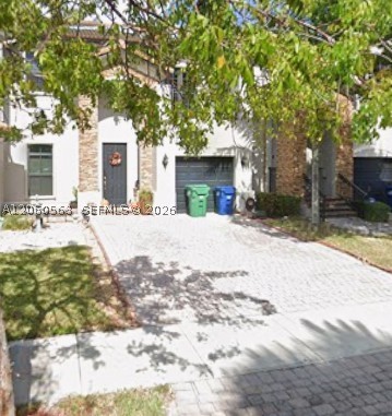 Discover this beautifully maintained and thoughtfully upgraded 4-bedroom, 2.5-bath townhouse with a 1-car garage, offering 2,305 total s/f. This move-in-ready home features a fully remodeled kitchen with modern finishes, stylish cabinetry, and an updated design perfect for everyday living and entertaining. Elegant wood flooring extends throughout the staircase and the entire second level, including all four spacious bedrooms. Each bedroom is equipped with custom-built closets, providing exceptional storage and organization. Enjoy added comfort with ceiling fans and remote controls in the living room and every bedroom. Impact-resistant windows and French doors throughout the home offer enhanced safety, energy efficiency, and peace of mind. Step outside to a covered patio with a ceiling fan, creating the ideal space for relaxing or entertaining year-round. Enjoy peaceful lake views that add to the home's charm and appeal.
