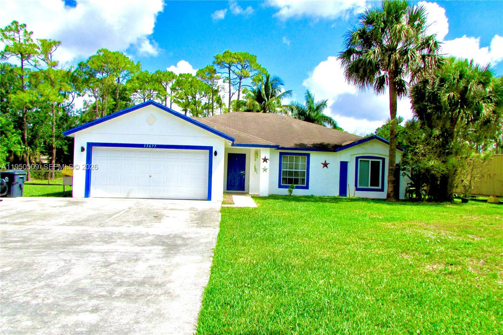 Welcome to 13677 Temple Blvd, a well maintained home situated on over one acre of fully fenced land in a desirable acreage neighborhood with paved road access. This property offers privacy, space, and versatility rarely found at this price point.  The expansive outdoor space includes a barn suitable for horses, open land for multiple uses, and two CONEX containers ideal for secure storage, a workshop, or future projects. (NO HOA)
Inside, the home features a split-bedroom layout for added privacy, bright and open living areas, and an efficient galley-style kitchen that connects seamlessly to the main living spaces. A screened in patio provides a relaxing spot to enjoy peaceful views of the property year-round.
Recent improvements include a newer roof, HVAC system, updated bathroom vanities, and updated water system, offering comfort, efficiency, and long-term value. Conveniently located with easy access throughout South Florida, this property delivers the ideal balance of space, privacy, and accessibility.
A serious seller, a well cared for property, and an opportunity worth seeing in person.