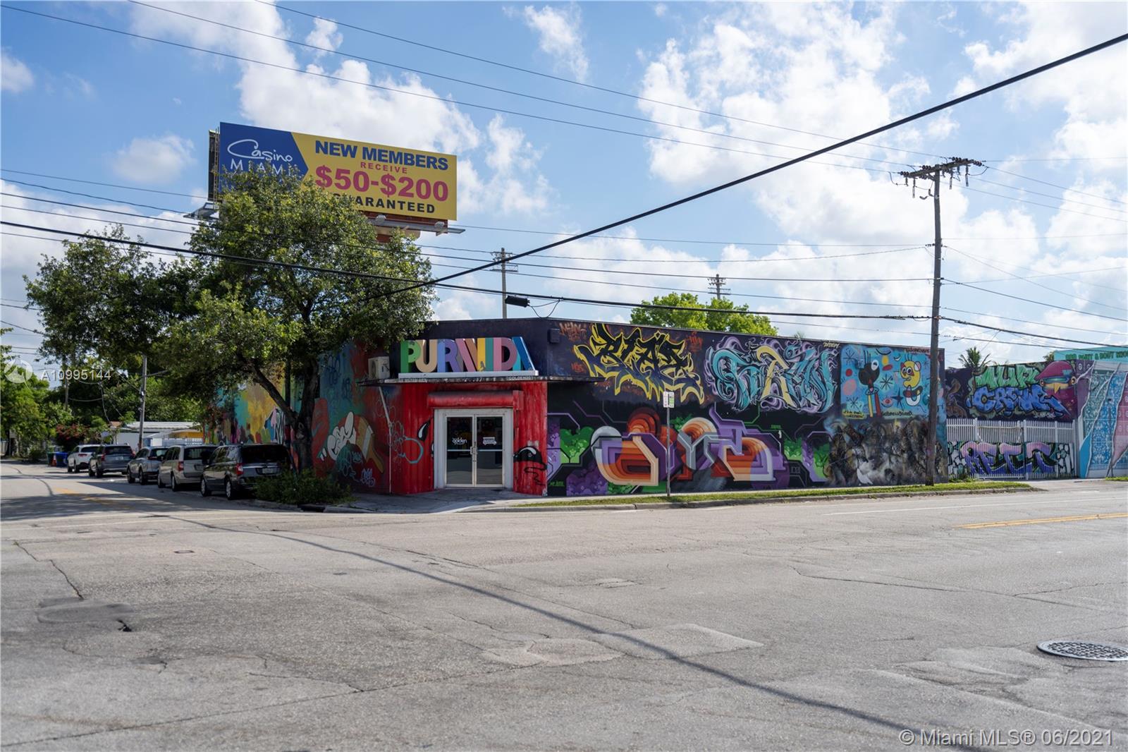 Developers, investors jump on this great development opportunity currently zoned T6-8-O, this is a corner lot with a 6,000 Sq ft. warehouse currently divided into 5 spaces, 3 accessible from the side yard with ground level roll up doors and the other 2 accessible from the street, can easily be converted back to single warehouse. Come take a look at this piece of street art that's hard to miss as you drive by, every year for Art Basel you have artist from all over the world come and display their works of arts on the walls. Do not disturb tenants! Please use show assist, showings by confirmed appointments only.