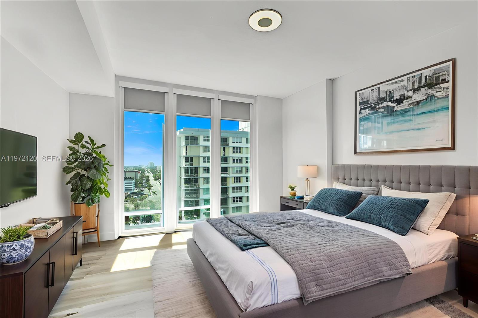 JUST REDUCED!!! ~RESORT LIFESTYLE LIVING~ Stunning 2-bedroom, 2-bath water-view condo in North Bay Village. Floor-to-ceiling glass and a full-length balcony deliver breathtaking water views from the living area and both en-suite bedrooms. The primary suite features a spacious walk-in closet, double vanity, and sleek glass-enclosed shower. Open-concept layout with stainless steel appliances, in-unit washer/dryer, and ample storage including pantries. Full-service building amenities include pool, fitness center, and one assigned garage parking space. Fully Funded. Passed Rectification. Only 5 minutes from the BEACH! Please ask us about the 3-2-1 approved lender buydown. Meaning you get an interest rate as low as 3% with a monthly payment probably lower than what you're paying in rent!! Scroll down to "facts & features", click on "show more", then click "View virtual tour" for your Virtual Interactive Lifestyle Concierge! Ask anything. Explore everything.
