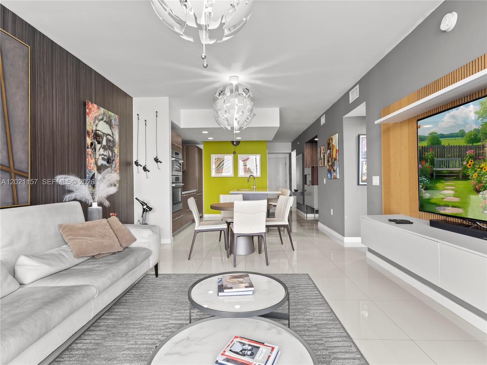 Midtown Doral living • 1BR + enclosed den with closet • Resort-style amenities • Easy access to Palmetto Expressway, Turnpike & Dolphin Expressway. Contemporary residence at Midtown Doral Condo 3 featuring 1 bedroom plus enclosed den with closet and 2 full bathrooms across 989 SF. Open-concept layout with porcelain floors, floor-to-ceiling impact windows, modern kitchen with oversized island, quartz countertops, custom cabinetry and luxury BOSCH stainless steel appliances. Spacious primary suite with dual-sink bathroom and glass-enclosed shower. The enclosed den with door and closet provides flexible space for home office, guest room, media room, or additional sleeping area. Private balcony with open skyline views. Includes 1 assigned parking space. Building amenities include resort-style pool deck, state-of-the-art fitness center, spinning studio, sauna, spa areas, club room, lobby concierge, and secured entry. Located in the center of Midtown Doral with restaurants, cafés, shops, and everyday conveniences nearby. Minutes from Downtown Doral, CityPlace Doral, Dolphin Mall, Miami International Airport, and major highways including SR-826, Florida’s Turnpike, and SR-836.