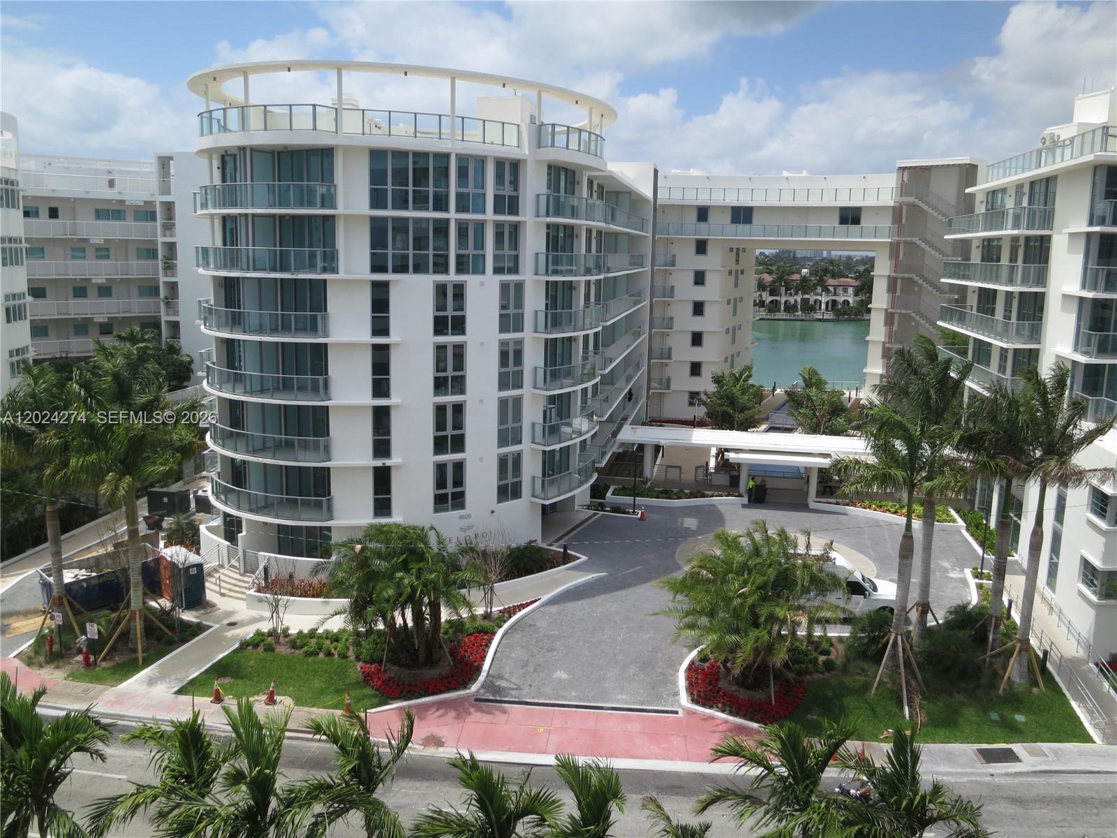 Experience elevated waterfront living at Peloro, an exclusive boutique condominium in mid-Miami Beach. This unique, two-story duplex offers a sophisticated open-plan layout spanning two levels, featuring seamless laminate flooring throughout. The residence provides a distinct separation of space, with the main entry, living area, and bedroom situated on the second level. A private staircase leads down to a versatile ground-floor den, offering convenient street-level access.  Located on the serene bayside, this residence offers the best of both worlds with beach access directly across the street. Residents enjoy access to premium luxury amenities, including a stunning grand atrium with cascading waterfalls, a waterfront pool, a state-of-the-art fitness center, and professional concierge services. Parking is managed exclusively via valet service. Currently rented at $2,920 per month through November 13, 2026, this property represents a premier opportunity in a highly desirable coastal enclave.  Please note that parking at Peloro is by valet only.