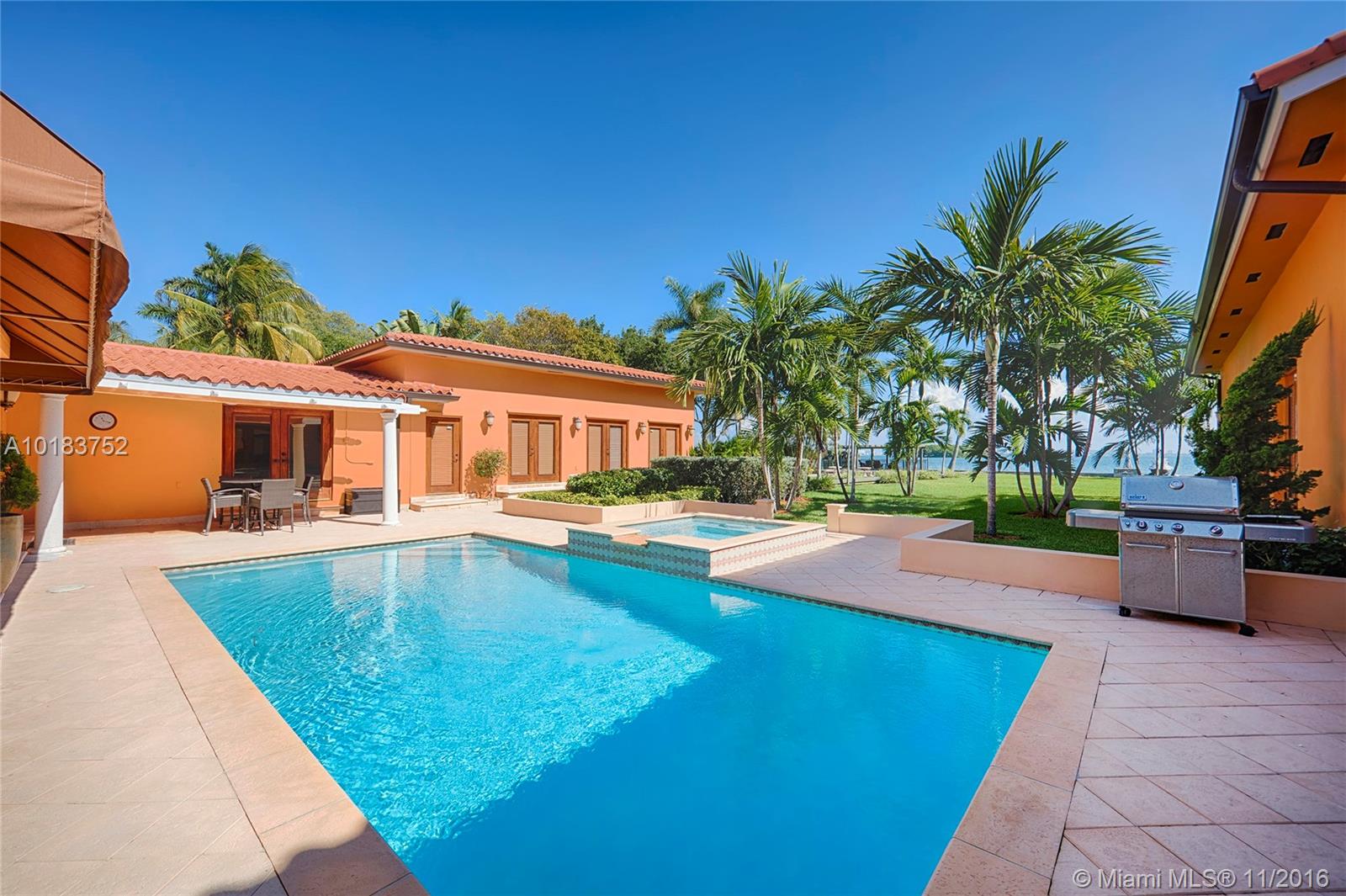 Located in the most desired Morningside area this modern Mediterranean Bayfront home sits on a completely gated, oversized 36,750 corner lot. The home boasts 4,707 SF w/Terracotta floors, large living & dining areas, open gourmet kitchen & family room. Spacious master suite faces open bay w/walk-in closet  & master bath w/sunken Jacuzzi tub.  Outdoor features pool w/Jacuzzi, 125FT of WF, 2 jetski lifts, long wooden walkway to a private gazebo with unobstructed views of Biscayne Bay.