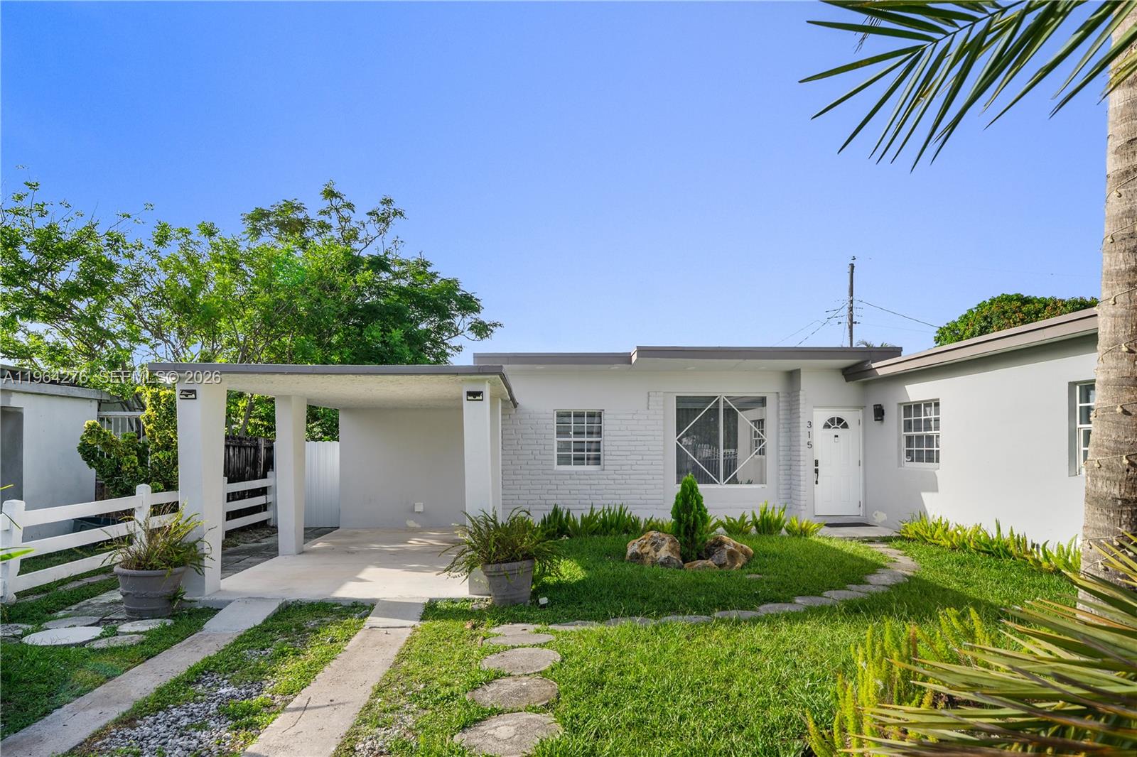 Welcome to your dream home—this stunning luxury family home offers the perfect blend of comfort, and tranquility. The property features 3 spacious bedrooms and 2 full bathrooms, soaring high ceilings, and an open-concept layout flooded with natural light. Step outside and take in the serene breeze of a quick neighborhood, complete with a bench for peaceful reflection. For ultimate relaxation, enjoy the backyard, or have some fun living close to every mayor event in Miami.